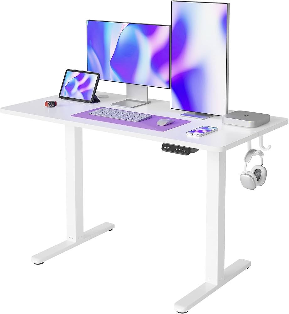 FEZIBO Height Adjustable Electric Standing Desk, 48 x 24 Inches Stand Up Table, Sit Stand Home Of... | Amazon (US)