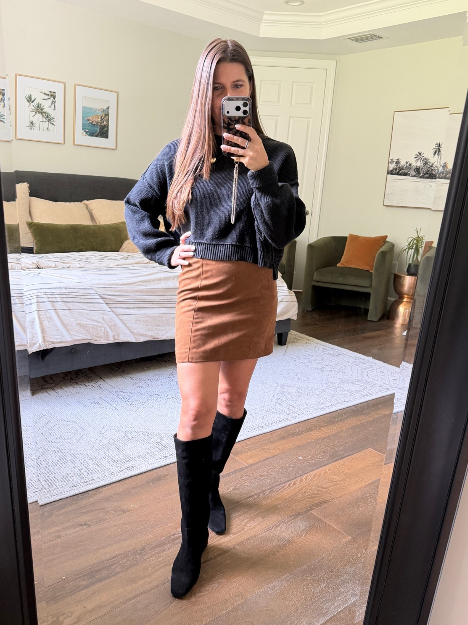 Amazon suede mini skirt for fall date night, styled with a black sweater and knee boots.

Amazon suede skirt, suede mini skirt outfit, black knee high boots, fall date night outfit, oversized black sweater, fall going out outfit, concert outfit fall, girls night outfit, holiday party outfit, brown suede skirt