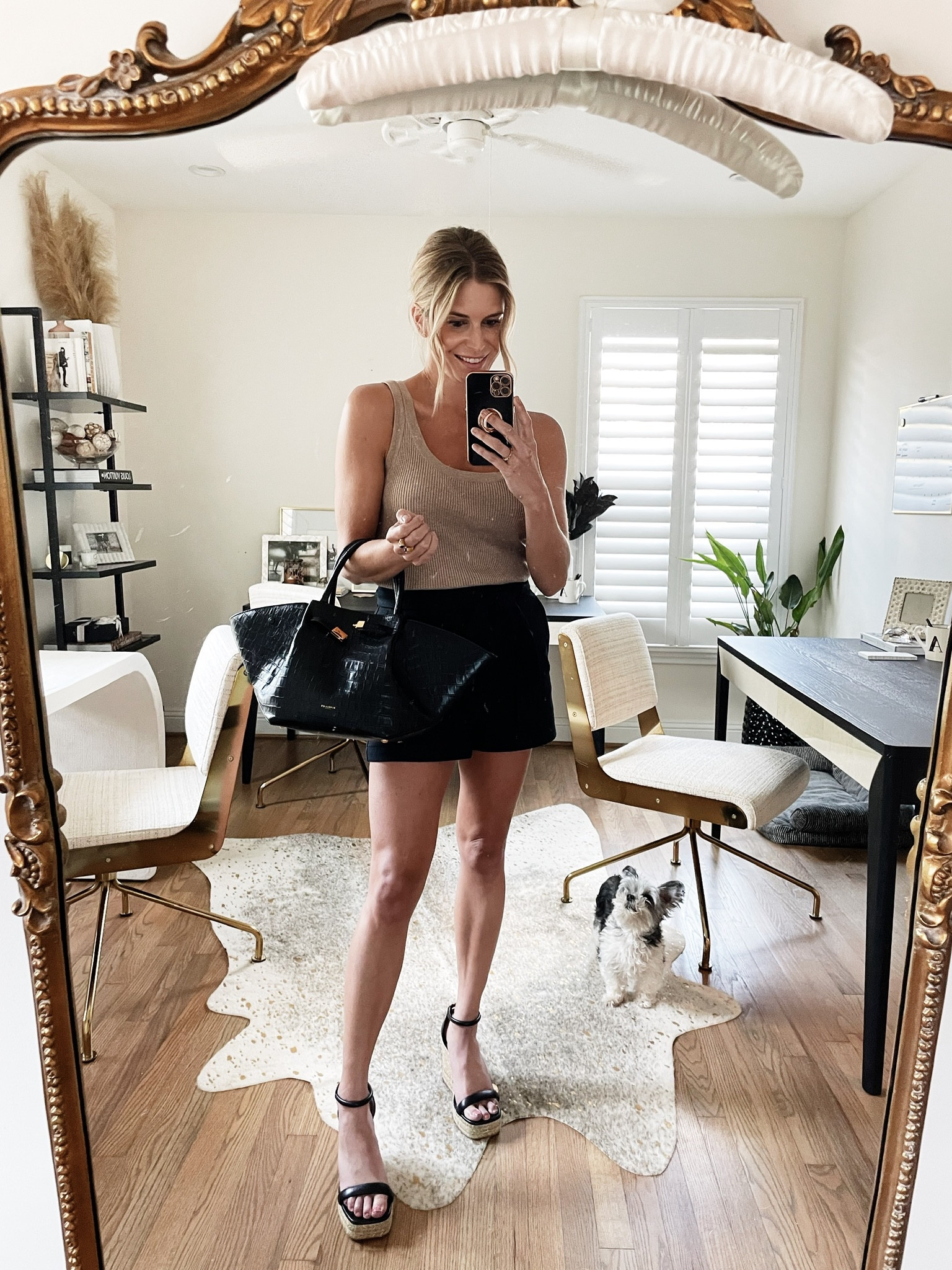 Brown tank with black shorts for fall 

#LTKshoecrush #LTKstyletip #LTKSeasonal