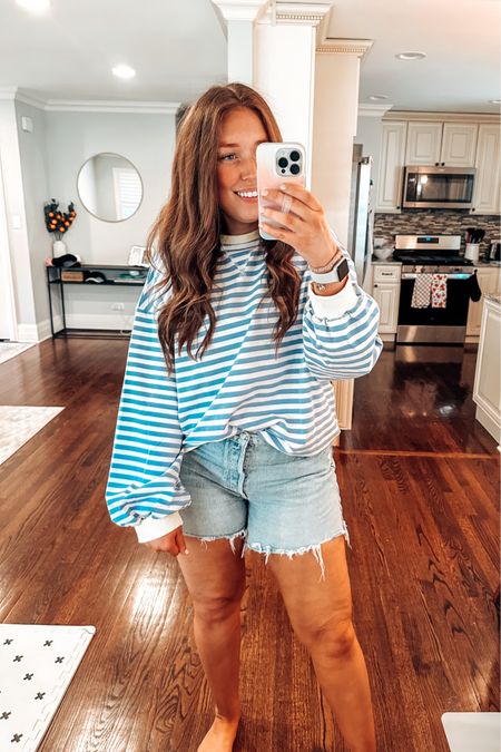 Wearing size XL. Runs more tts than oversized. Size up 1 if you want a more oversized fit. Comes in a bunch of colors. Very similar to a more expensive sweatshirt. 

Sweatshirt / spring outfit / summer outfit / stripes / striped sweater / coastal grandma / midsize 

#LTKtravel #LTKmidsize #LTKfindsunder50