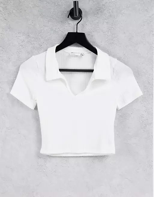 ASOS DESIGN fitted polo top in rib with short sleeves in white | ASOS (Global)
