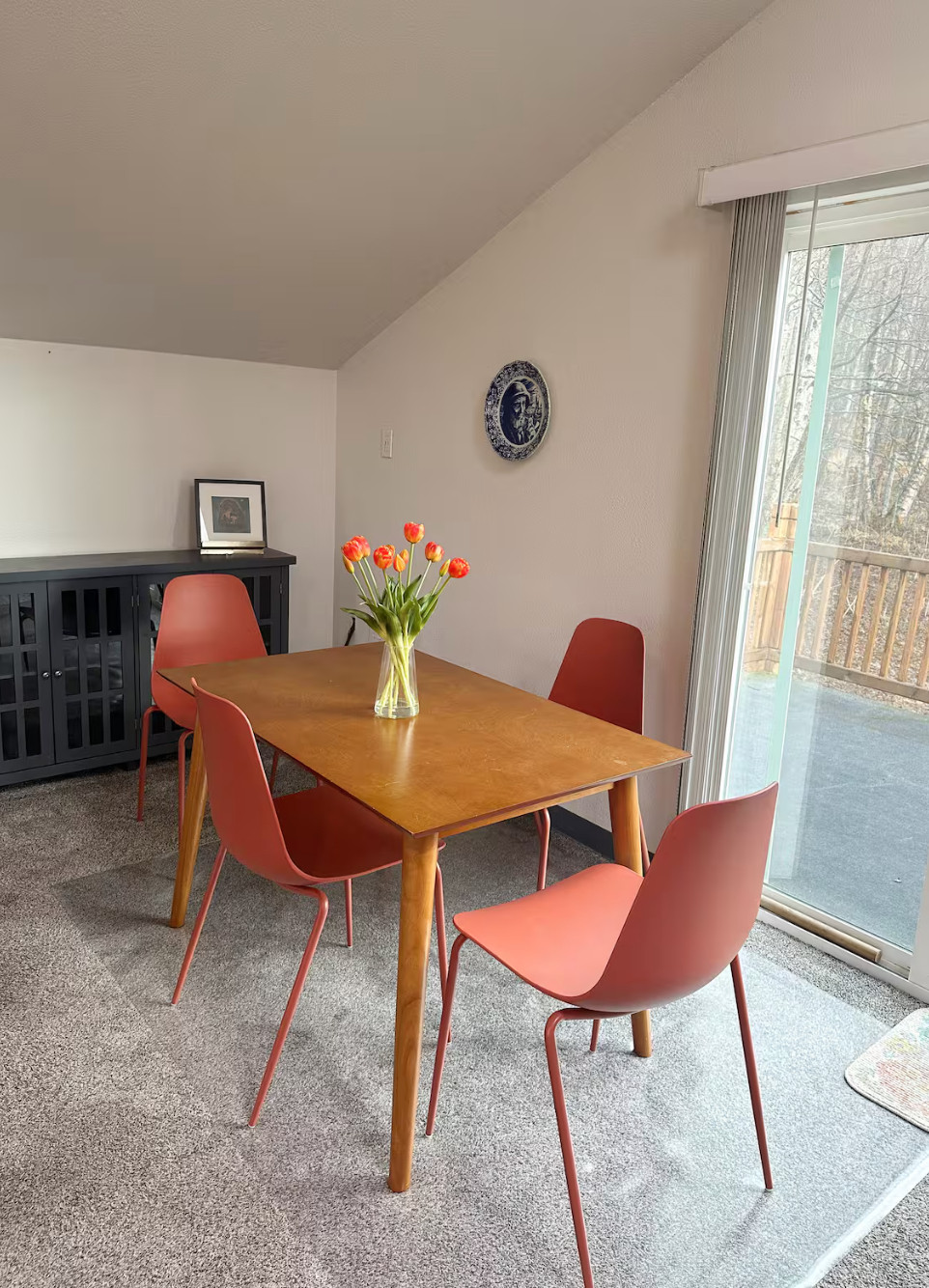 Finding those cozy corners, even when you're traveling! ✈️ This little dining nook in our current Airbnb is giving me all the good mid-century modern vibes. The warm wood table paired with these fun terracotta/burnt orange dining chairs is such a great combination. It makes even takeout feel a little special! ✨

I tracked down similar styles for the chairs and table, plus a few suggestions for the decor if you're looking to recreate this easy, stylish look in your own home. 

 #LTKHome