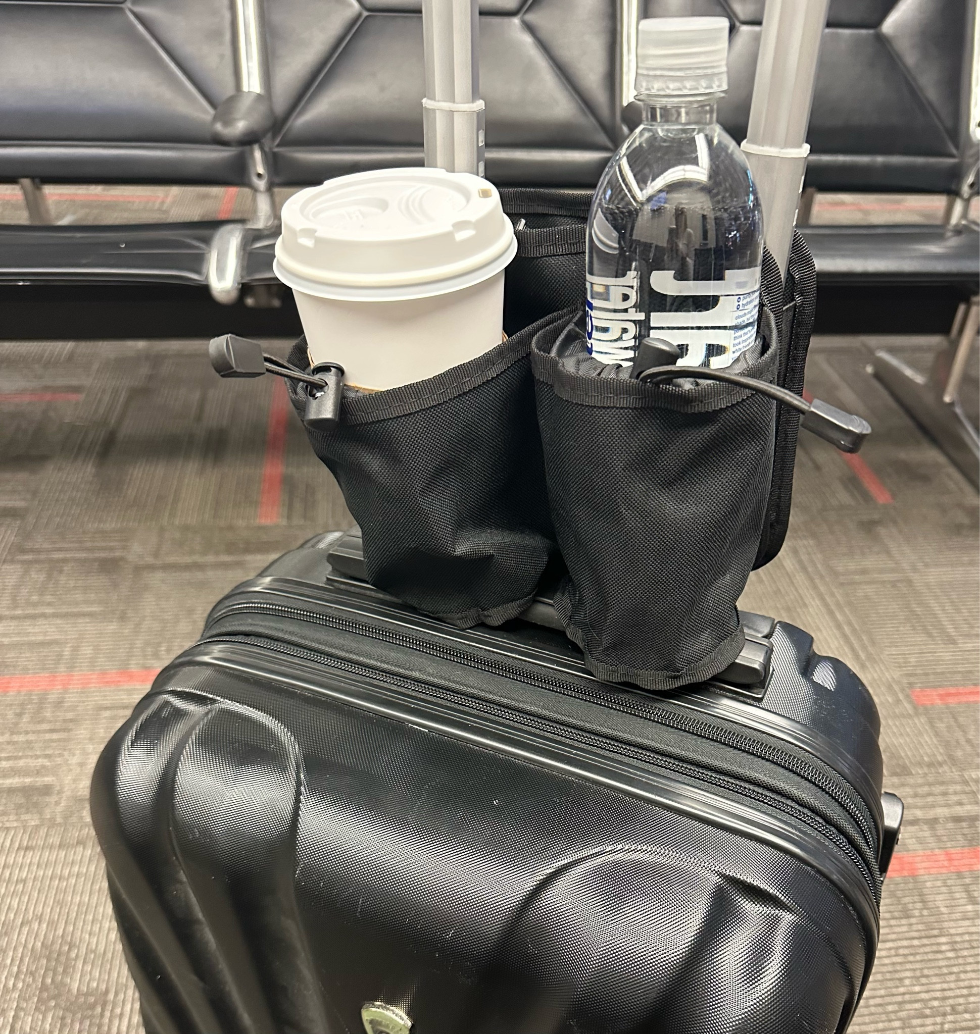 Love this beverage holder for traveling. It has two pockets on other side as well for extras. Perfect for standing in line or traveling with kids. Also added a few of my other favorites when traveling 

#LTKtravel #LTKitbag #LTKfamily