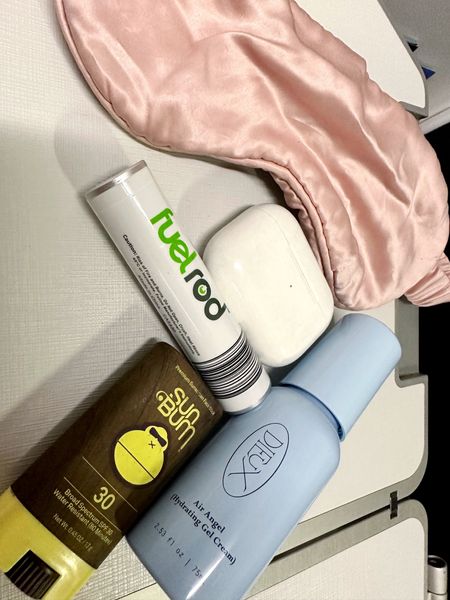 Inflight essentials. Always pack the goodies while flying. I packed a moisturizer, silk eye mask, sunblock, charger and AirPods. #travelessentials #flyingessentials #travelskincare #sunbum #facesunstick #noisecancellingheadphones #fuelrod #travelcharger #essentialsforflying 

#LTKtravel