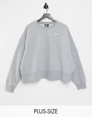 Nike Plus Trend Fleece cropped crew neck sweatshirt in gray | ASOS (Global)
