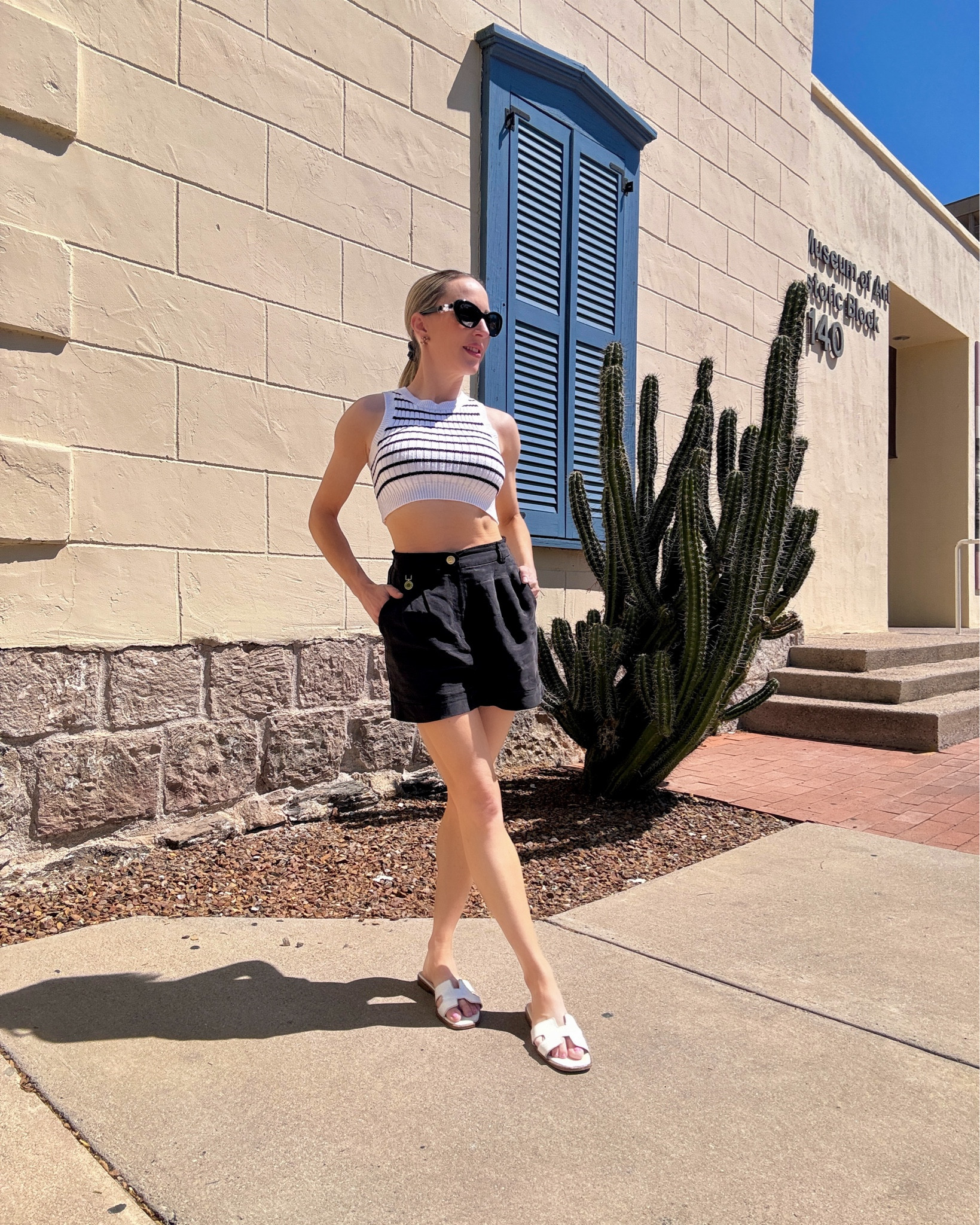 Casual outfit : high waisted black shorts for women and black and white striped sleeveless top. Add a blazer or coat for a transitional season or early Fall outfit. PS if you only buy one pair of flat white sandals these are my most worn ever, have had 3 years of wear and are still going strong!

#LTKStyleTip #LTKSeasonal #LTKShoeCrush