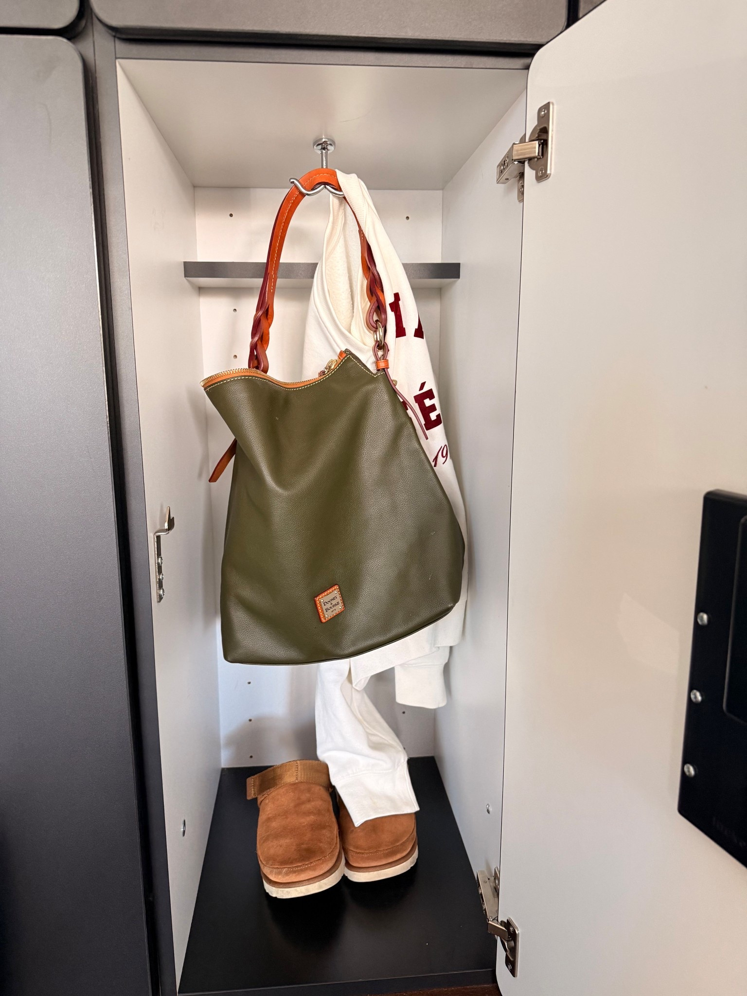 Let's take a moment for my locker during Pilates class!

I'm so happy today was sweater weather in Southern California. 

Dooney & Bourke | sweatshirt | uggs | fall outfit | workout outfit | 

#LTKActive #LTKSeasonal #LTKShoeCrush