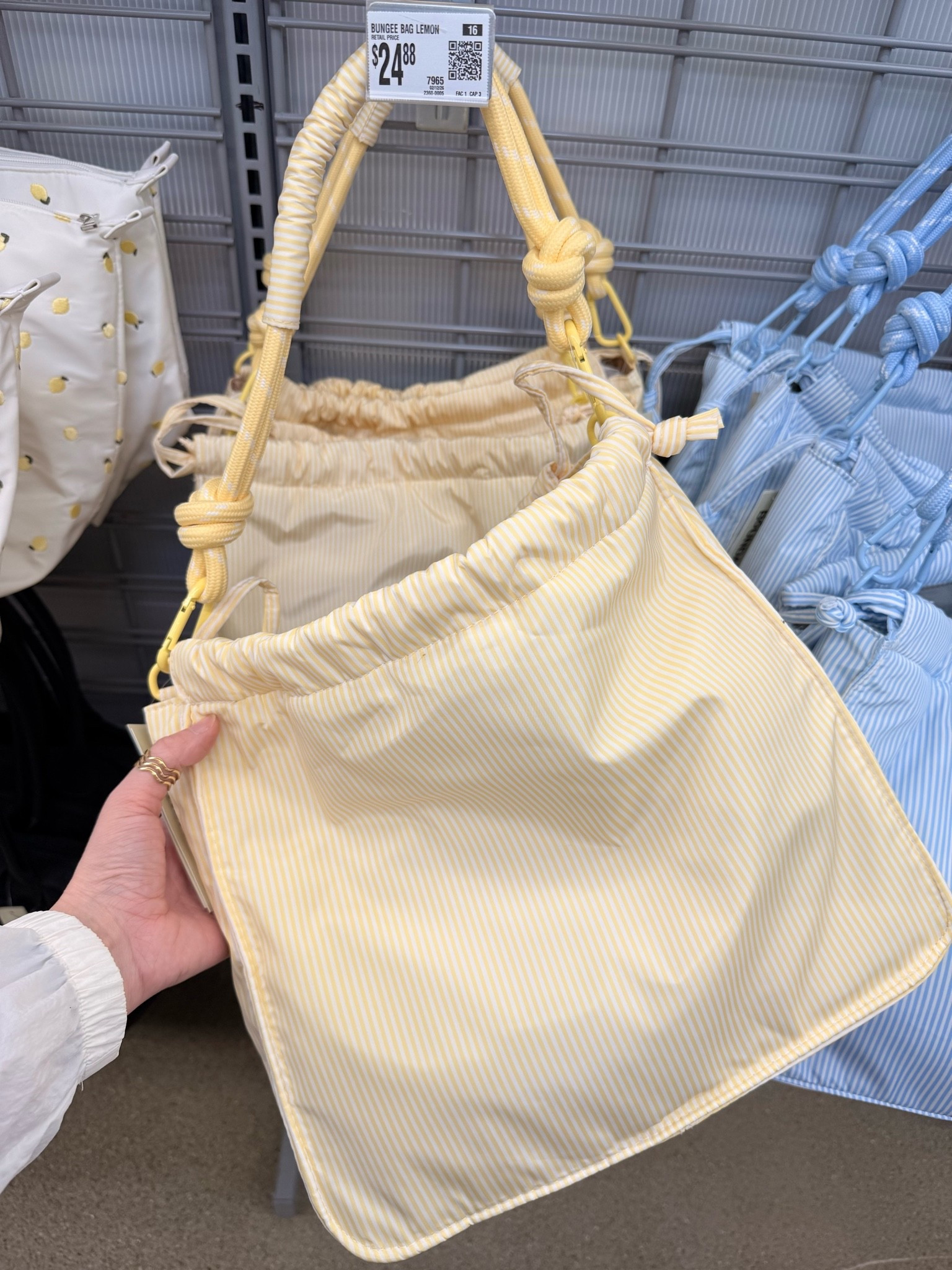 This lemon bungee bag 🍋 is the perfect for on-the-go moms this summer! #walmart #walmartfinds #bags #momfinds #momlife #accessories

#LTKmomlife #LTKTravel #LTKootd