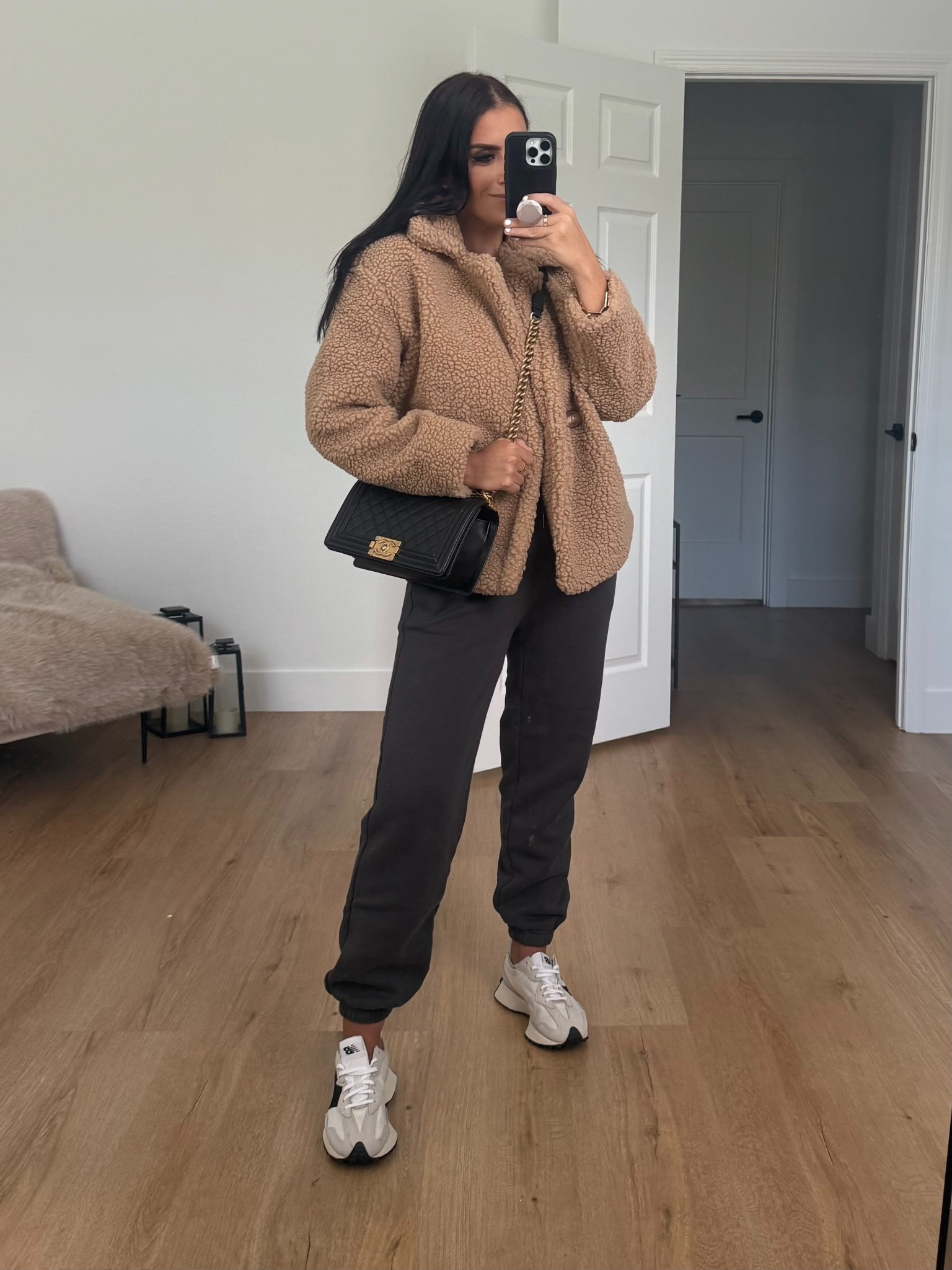 Time and Tru Women's Cozy Teddy Double Breasted Jacket wearing size small. Abercrombie Sunday Sweatpant wearing size small. New Balance Sneakers
