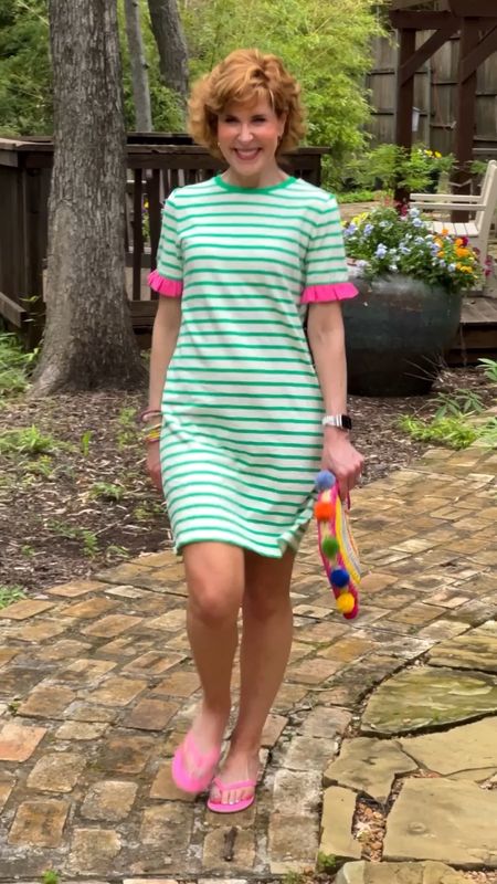 I love how the flirty ruffled sleeves elevate the basic tee shirt dress (although it’s cut for a woman’s curves, which is awesome)! It fits TTS & comes in 5 different colors/prints.

I paired it with pink flip flops that are under $20 and the most darling colorful raffia clutch purse with pom pom trim!

#LTKVideo #LTKFindsUnder100 #LTKStyleTip