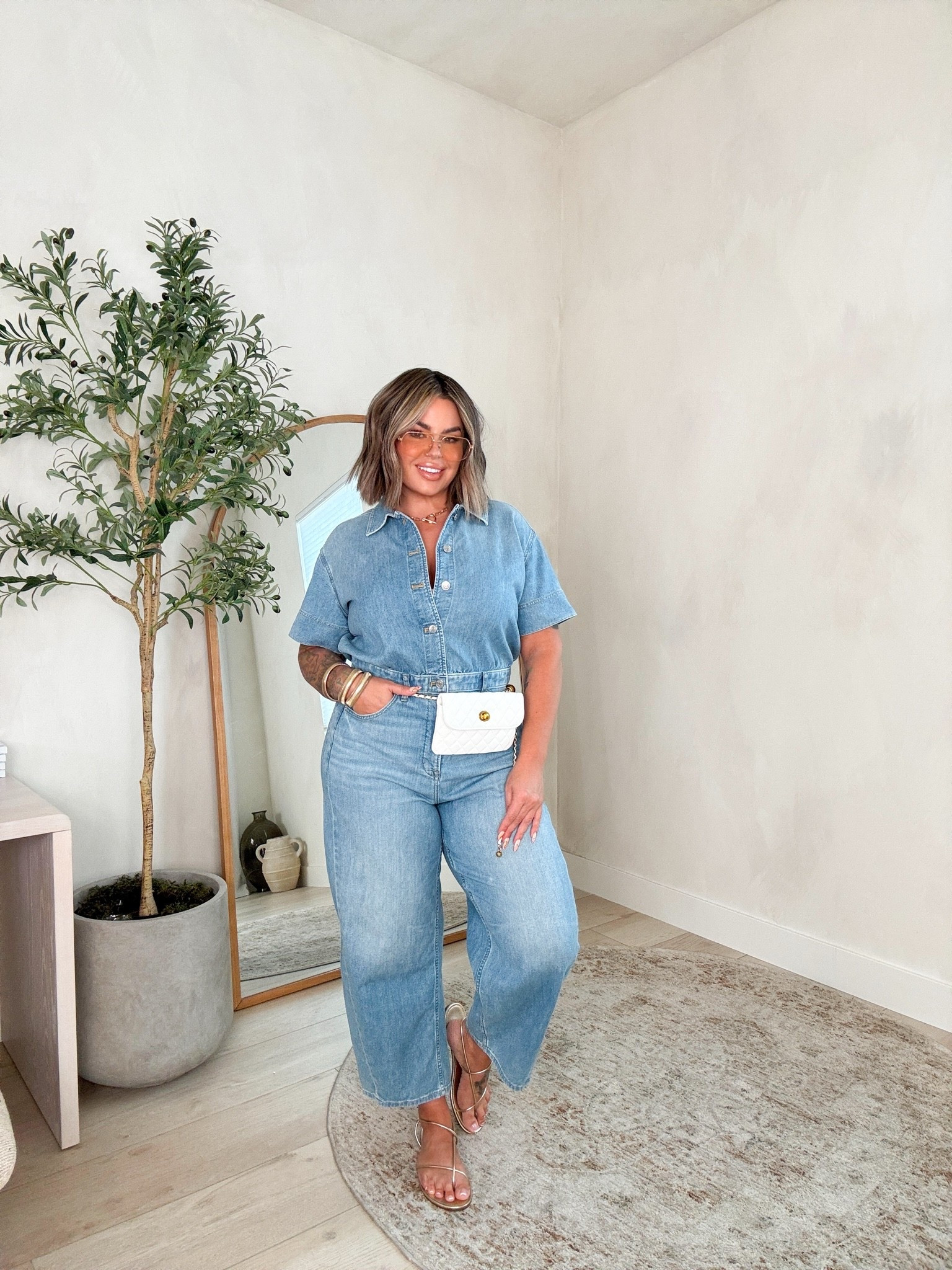 Splurge worthy item ! 

Super soft denim jumpsuit that’s easy to get in and out of. Gives good arm coverage and it’s a perfect length on me for a flat or a heel. 

Size L reg length