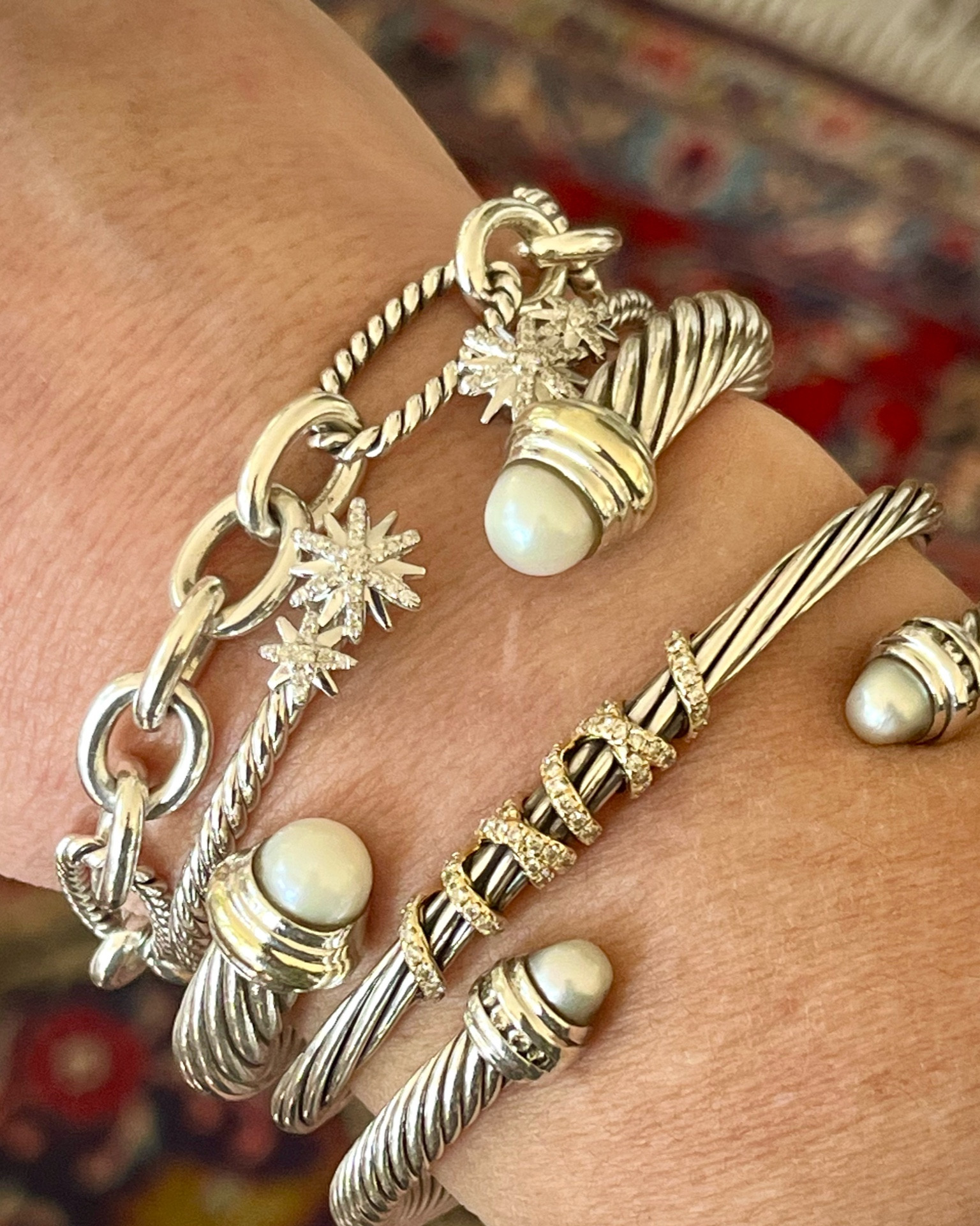 I’ve been wearing David Yurman jewelry for about 25 years. It’s so classic and I love a simple bracelet stack. Though I have several other pieces, this is my everyday stack. Just added the sunburst cable bracelet at Christmas. There’s so many gorgeous things to choose from - perfect for Valentine’s Day gifts! Also a really good men’s selection. 

#LTKMostLoved #LTKGiftGuide #LTKstyletip