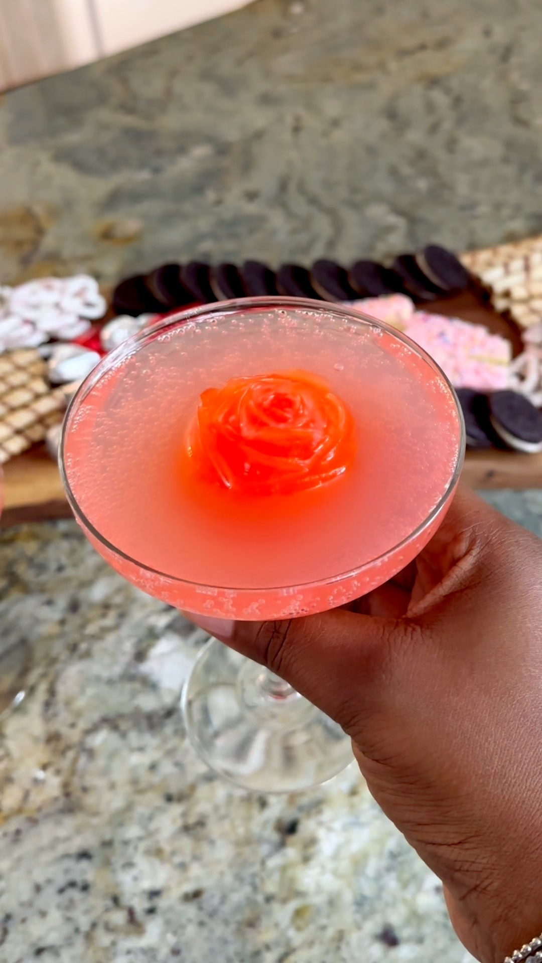 Easy Hosting Hack: Rose Ice Cubes
Valentine’s Day Drink 🌹

Y’all, this a cute Valentine’s Day drink idea may look fancy but is so easy to make.

1. Freeze your favorite red juice (I used Hawaiian Punch, but any red juice works) in rose-shaped silicone molds overnight. 

2. Pop the frozen rose into a martini glass and pour pink lemonade over it for the prettiest contrast.

3. Keep it kid-friendly as a mocktail, or add vodka if you want to turn it into a cocktail. 

Perfect for Valentine’s Day with your kids, your girlfriends, or date night at home. 💕

Want the links for the molds and glasses? Tap the link or send me a DM. ✨
.
.

#valentinesdaydrinks #valentinescocktails #icemolds #mocktailideas #cocktailinspo 

#LTKfoodie #LTKValentine #LTKdayinmylife