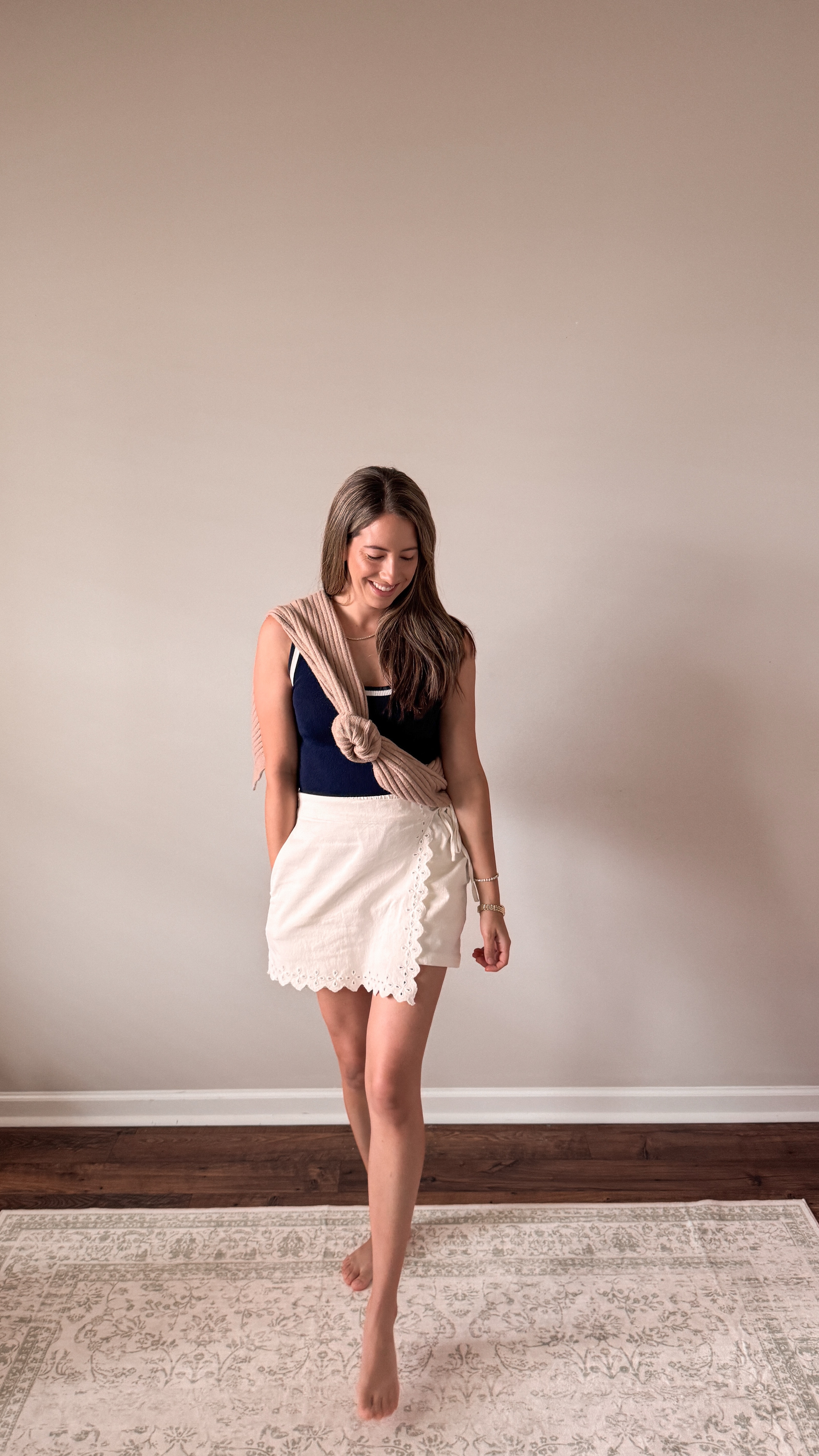 Navy and white skirt outfit of the day. Love how this navy tank styles with this white skirt

#LTKFindsUnder100 #LTKStyleTip #LTKSummerEdit