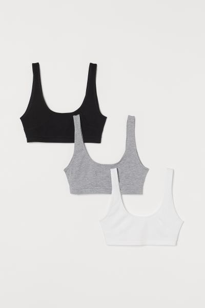 Bra tops in cotton jersey with wide shoulder straps and unlined cups for natural shape and light ... | H&M (US + CA)