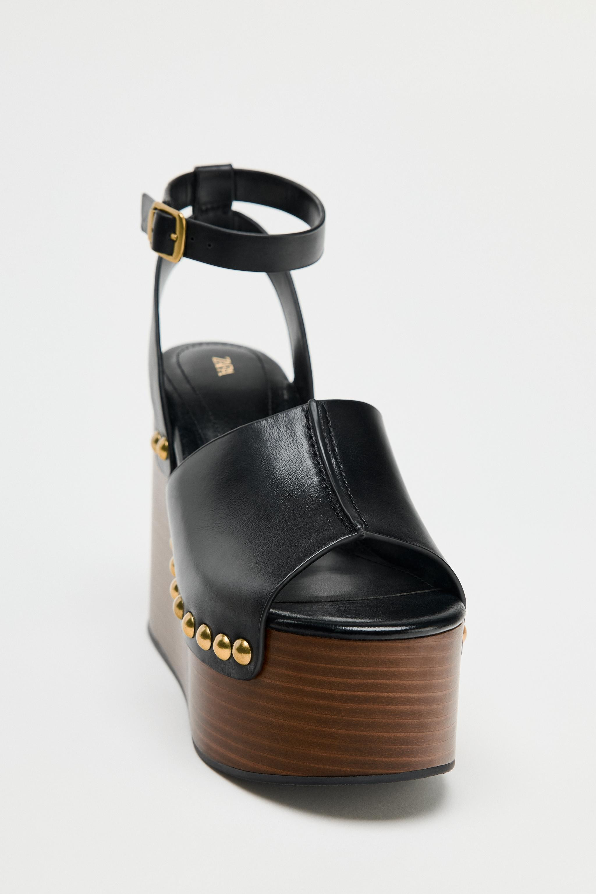 Leather wedge sandals. Studded detail at sides. Platform sole. Front strap with topstitching. Ank... | Zara US