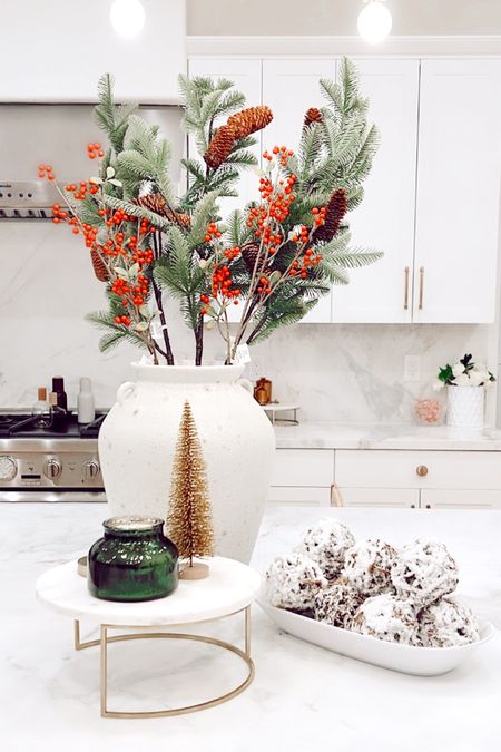Kitchen counter holiday decor. Christmas candle. Large vase. Holiday branches. 

#LTKSeasonal #LTKhome #LTKHoliday