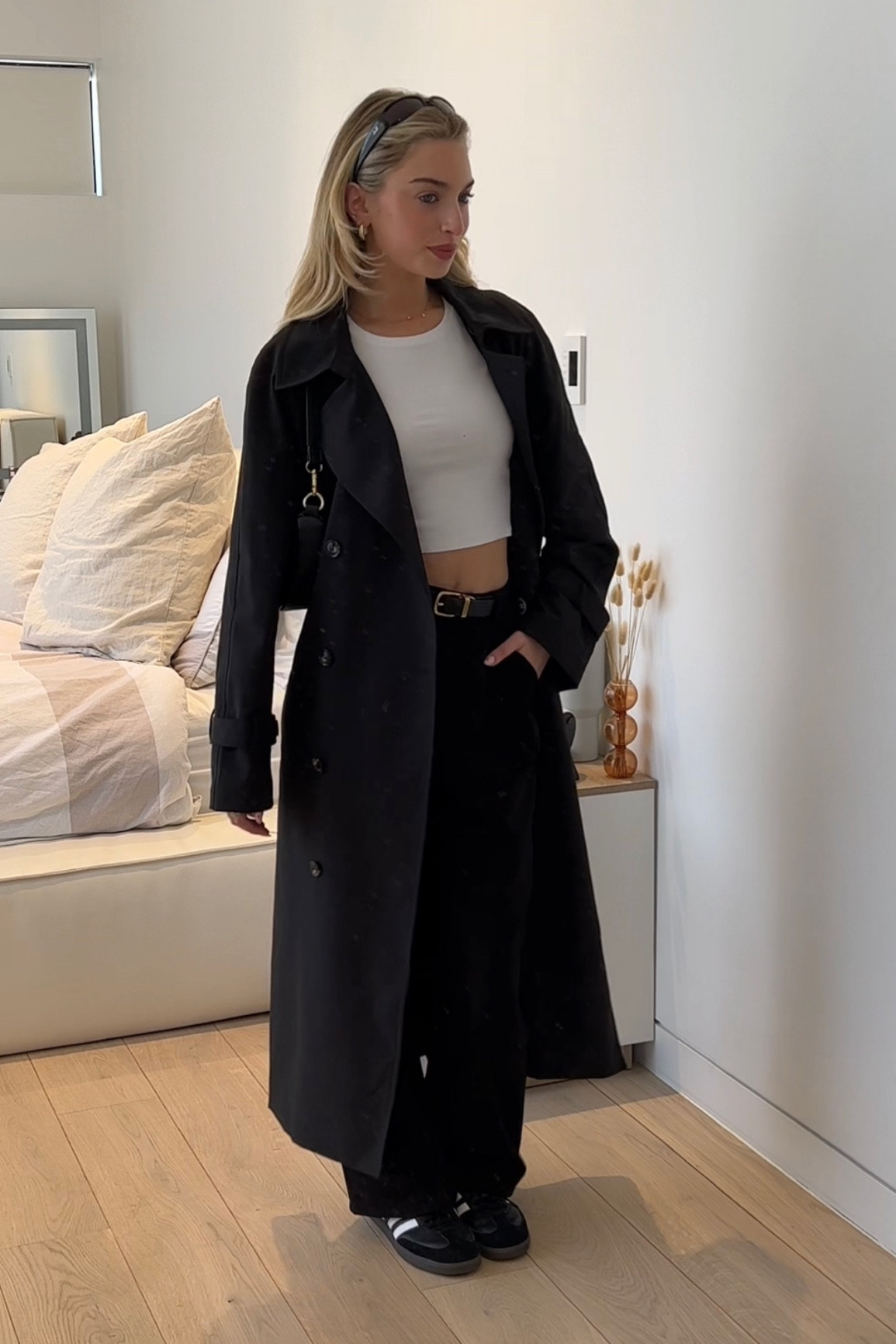 Outfit 3 of 3 same base outfit, 3 different looks🖤

Added a gorgeous black trench coat to keep a black and white theme. And also added a black and gold hardware belt to elevate this outfit further🫶🏼

I’ve linked lots of similar items as most of the items I am wearing are not sold anymore <3

#LTKstyletip #LTKaustralia #LTKshoecrush