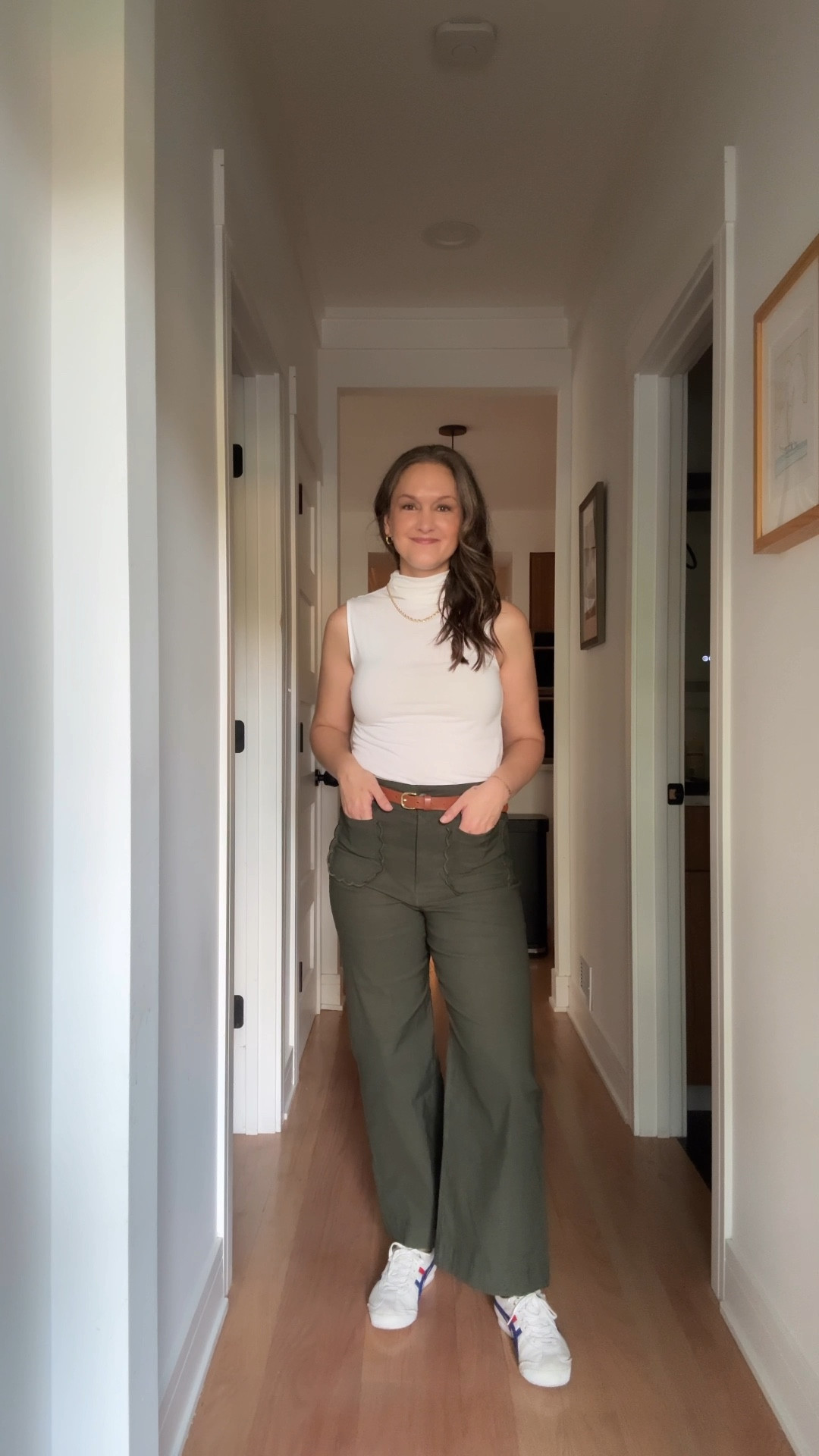 It’s the last Thursday in July, and the city mom is channeling effortless chic in a pair of green pants with scallop detailing on the pockets, a sleek sleeveless white mock turtleneck, and her favorite sneakers—because even a day full of tasks needs a touch of cool comfort. Her graduated rope necklace adds the perfect dash of elegance, and her new stack of permanent bracelets catches the light as she moves through her busy day. After dropping Miles off at daycare, she plops down in front of her computer to field emails from authors helping her launch an exciting new project. A quick break to get her brows done—because, hello, family photos next week—then it’s back to business as she puts the finishing touches on blog posts that have been keeping her up at night. She’s out the door again for physical therapy, where they introduce agility exercises for the first time, feeling like a new challenge is exactly what she needed. A few more hours of work and then, finally, it’s time to pick up Miles and meet friends at the Argyle Market for an evening of good food, laughter, and the energy of the city she loves. She may be running on a packed schedule, but she’s nailing every single moment of it—looking effortlessly fabulous along the way.

#LTKSeasonal #LTKStyleTip #LTKWorkwear