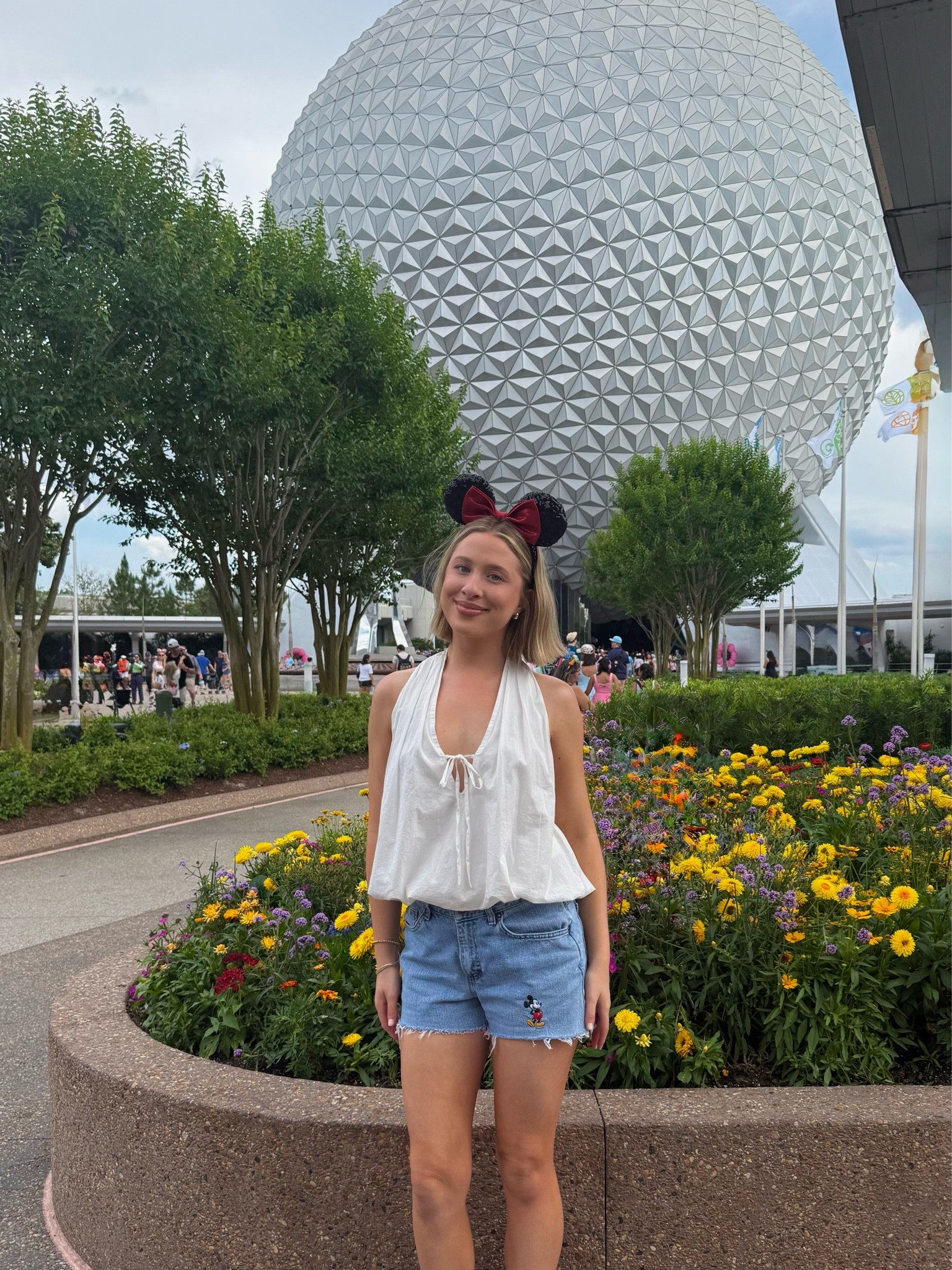 Went down a size to an XS in my Free People bubble top
My Mickey embroidered jean shorts are from Main Street Vintage Co on Instagram (Linked some other options!)
I got my Minnie ears in Magic Kingdom! 🏰 
New Balance 530’s
Amazon white ruffle socks
Baublebar earrings & bracelets

#LTKootd