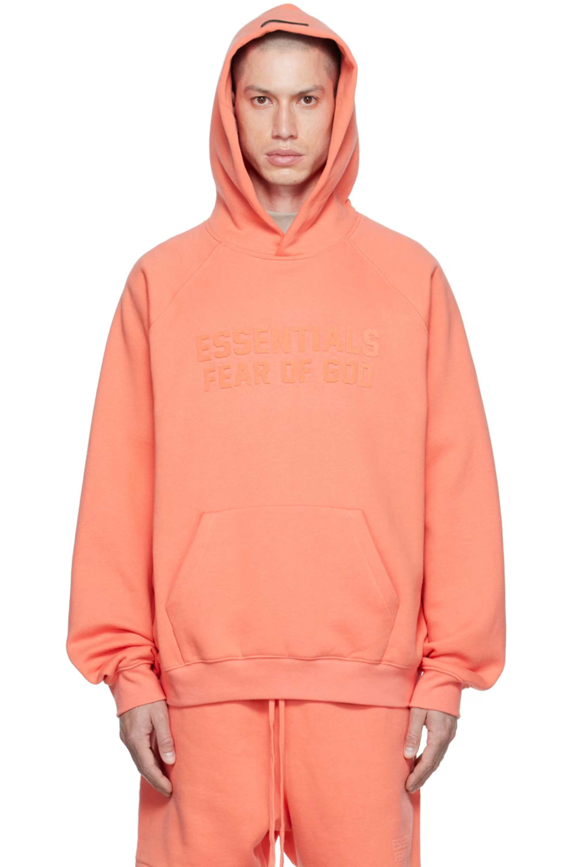 Fear of God ESSENTIALS - Pink Raglan Hoodie | SSENSE
