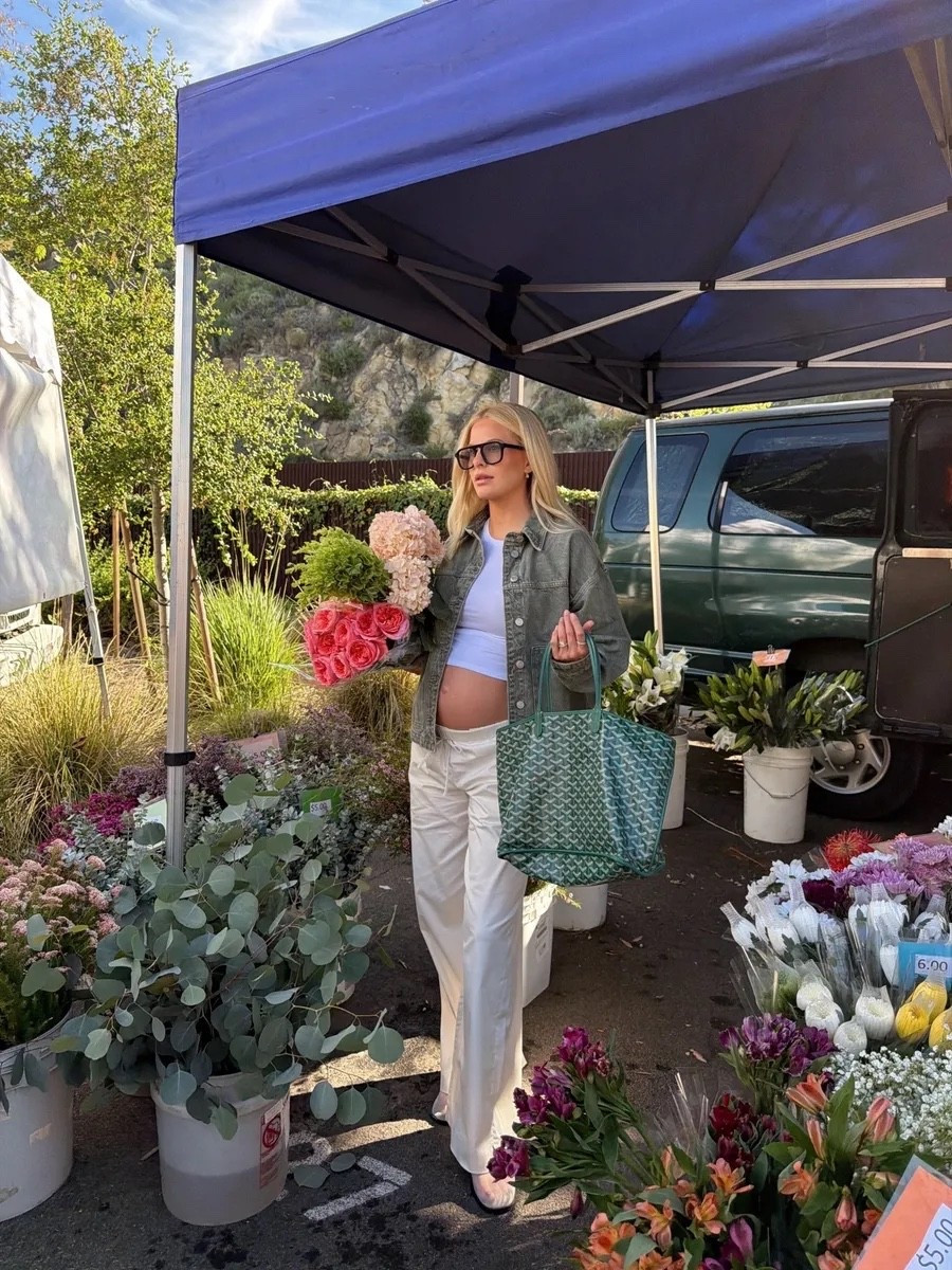 Small in jacket, med in tee, med in pants (sized up for pregnancy), true size in shoes. Code KathleenPost for first month free at Vivrelle- where my bag is from! 

Farmer’s market outfit, bump style, spring outfit 2026, pregnancy outfit, spring transition

#LTKBump #LTKSeasonal #LTKootd