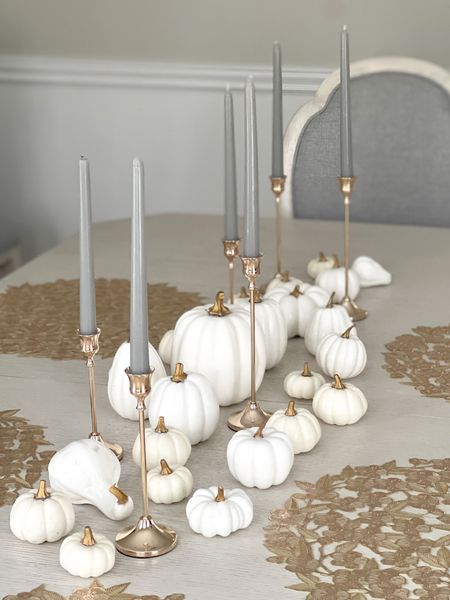 Gold Thanksgiving table. Gold flower placemats, taper candles, gold antique style candlestick holders, white pumpkins with gold stems  

#LTKhome #LTKSeasonal #LTKunder50