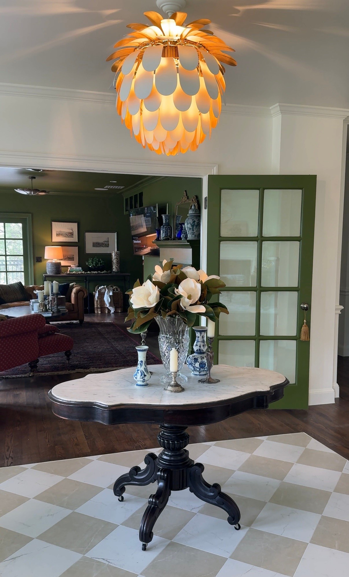 One of the most asked about lights in our home 🤍 Our pinecone foyer light has the most beautiful warmth and detail to it with the soft gold underneath paired with the white exterior. The reflection it gives off when illuminated feels so elegant and timeless, especially in the evenings. Such a beautiful statement piece for an entryway, hallway, or layered traditional home.

#TimelessLighting #Chandeliers #CollectedHome
