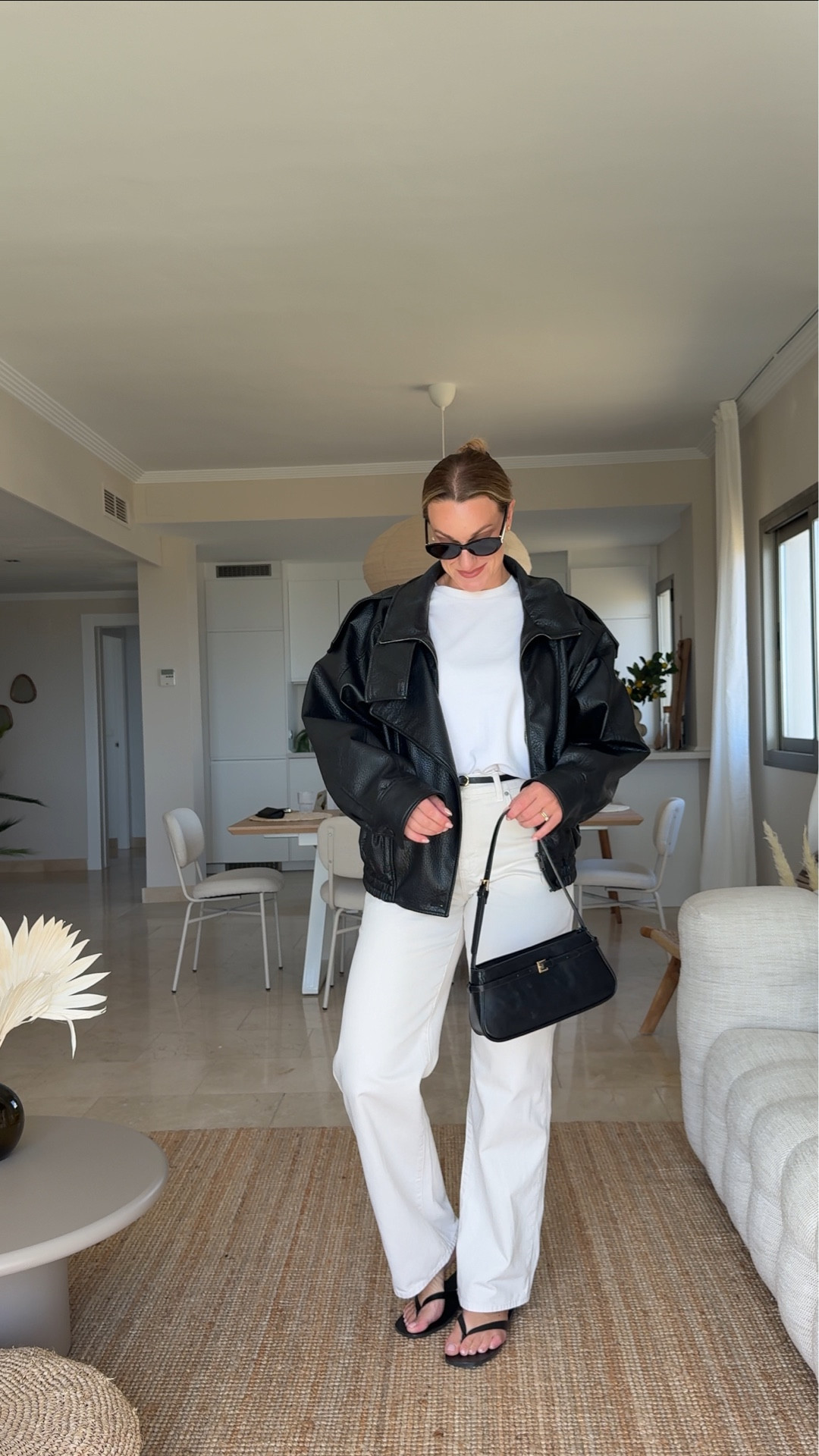 Day one 30 days of mid-size friendly spring outfits on my size 12 to 14 body ￼
off-white straight leg jeans, plain white boxy T-shirt, leather oversized jacket, leather black sandals, black minimal bag, black YSL sunglasses, black leather belt

#LTKeurope #LTKspring #LTKmidsize