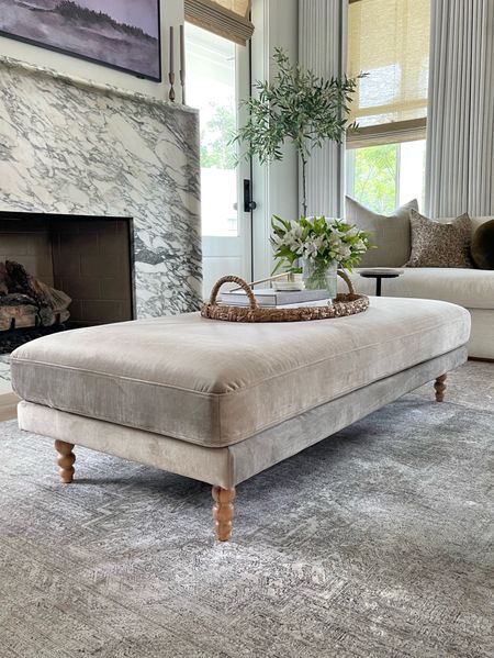 Obsessed with our new custom made ottoman!!!  I had it covered in a rich performance velvet color called Mink and chose a beautiful solid oak leg.

Living room furniture, living room rug, oversized ottoman, coffee table decor and books, basket for coffee table, white linen curtains, sofa pillows 

#LTKHome #LTKSaleAlert #LTKStyleTip