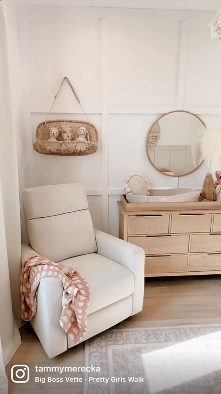 Sharing my favorite spot in Quinn’s nursery ✨

If you follow my stories you may have been there when my husband made this accent wall - it made such a difference in this space and cost less than $200. The glider and dresser from @nurture_and are must haves. I wasn’t sure how to complete this space and these pieces just brought the whole room together. 

The glider is electric which makes it so easy to recline and adjust the headrest without disturbing your baby. I also love that it has a built-in USB charging port - makes those late nights scrolling on my phone and listening to lullabies so easy. Use my code TAMMY50 to receive $50 off the glider.

The dresser is such a great size and I love how much storage it provides. I keep her accessories and diapers in the smaller top row of drawers and her clothes and bigger blankets in the larger bottom rows. I also added the diaper changing caddy on top which has perfectly sized dividers for her diaper changing basket and also organization for accessories. 

#nursery #nurseryinspo #nurserydecor #babynursery #bohobaby #babyroominspo #babyroomideas 

#LTKhome #LTKbump #LTKkids