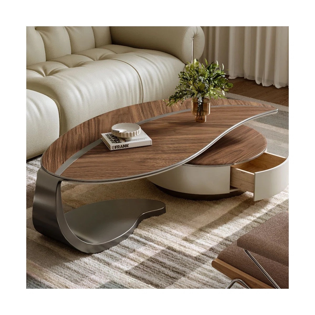 This coffee table balances sculptural design with practicality through its built-in drawers and fluid leaf silhouette. The walnut wood grain finish adds depth and warmth to any living space. ON SALE and under $1,000.

Keywords:

* leaf coffee table
* walnut coffee table
* wood grain coffee table
* coffee table with drawers
* modern center table
* organic modern furniture
* sculptural coffee table
* living room coffee table
* natural wood coffee table
* storage coffee table
* contemporary coffee table
* minimalist coffee table
* warm wood furniture
* apartment coffee table

#LTKSeasonal #LTKHome #LTKSaleAlert