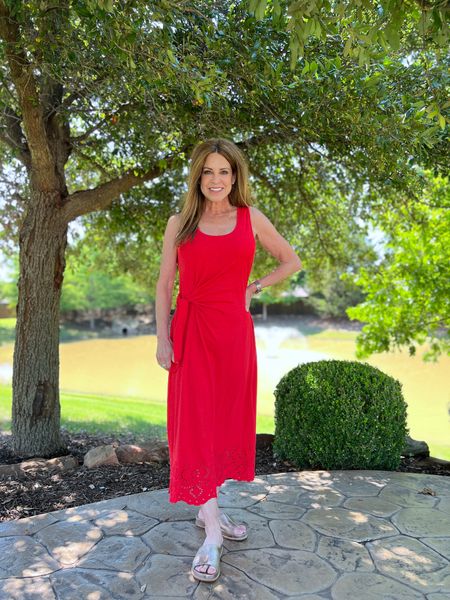 This red midi dress is a good option for a date night outfit! I love the tie on the side for a figure flattering fit and the bottom hemline has an embroidered eyelet which adds a nice subtle detail to this gorgeous color. I'm wearing size medium, but could've worn a small too. Paired with comfy gold cork slides that runs true to size.
#outfitidea #transitionalstyle #partydress #springfashion

#LTKSeasonal