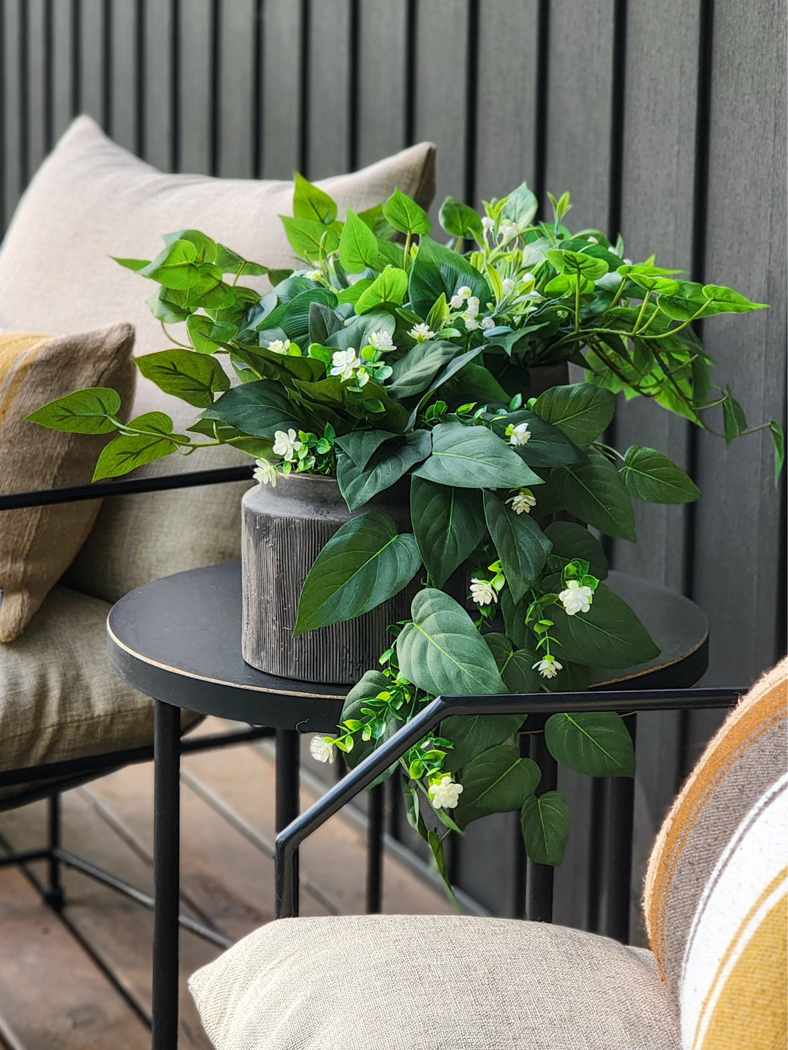 For this year's spring - summer front porch look, I used most of the same decor from last season with a sprinkle of new additions. 

Old || Striped lumbar pillows • black round transitional accent table

New || Contemporary metal chairs with tan cushions • Tabletop viral planters from Walmart filled with new and old artificial greenery + flowers

#LTKSeasonal #LTKHome