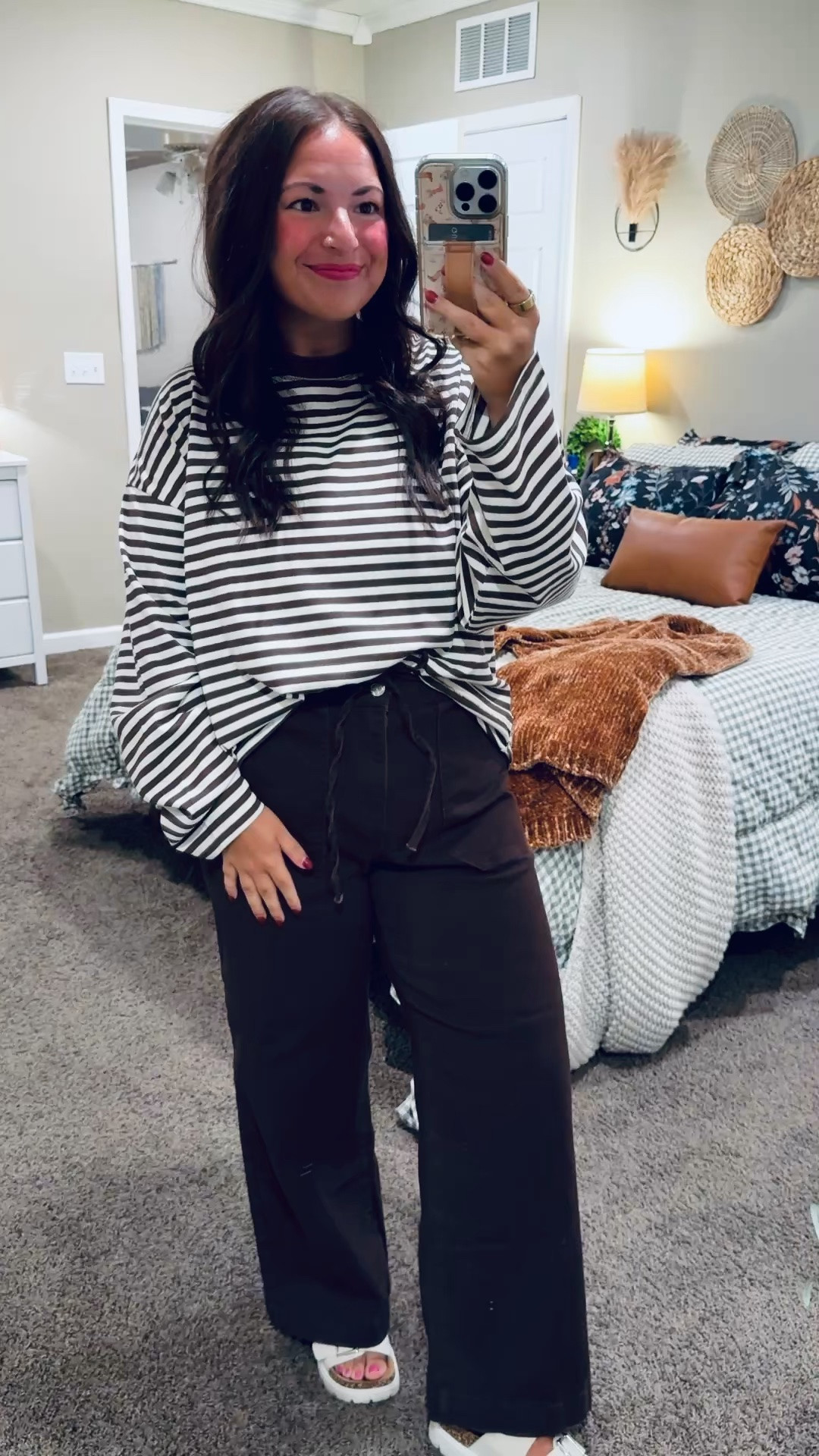 Stripes & chocolate brown are such a good combo! 🤎 Loving this relaxed long-sleeve top with wide-leg pants & white sandals. A little front tuck brings the whole look together!

sandals: sold out, but linking similar options below!
jeans: fit true to size // wearing a large
tee: fits oversized // wearing a large 

 #LTKootd #LTKMidsize #LTKWorkwear