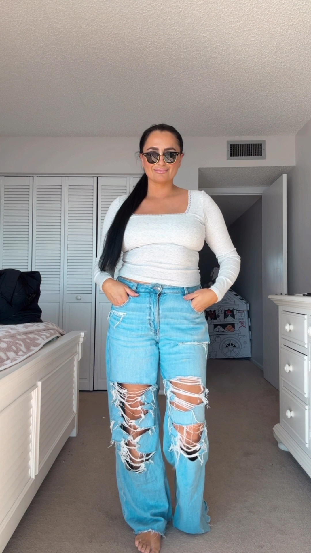 Minimalist mom outfit of the day - fits tts - size 12 jeans with stretch 
- medium long sleeve top

Capsule wardrobe, mom uniform, soft, ripped wide leg light denim, comfortable, grey long sleeve, American Eagle