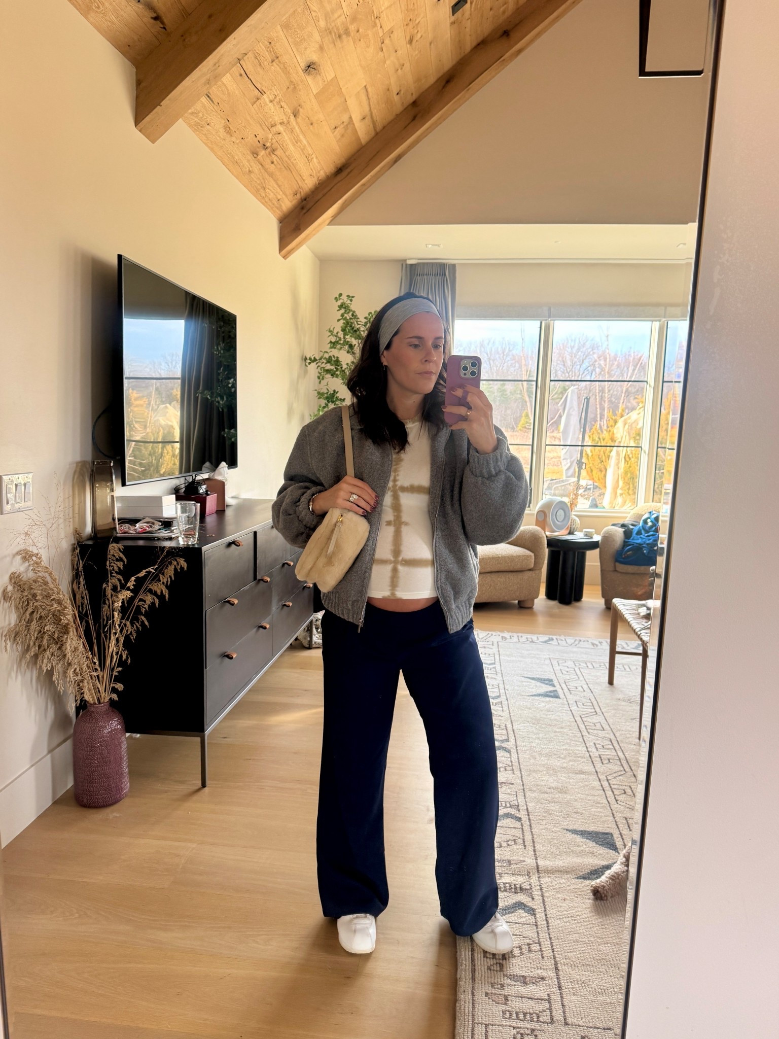 Another day of the basketball tournament. Still wearing our school colors in a more neutral way, skipping the red and adding tan. 

These pants are amazing Maternity trousers from Gap. Runs tts, wearing a small. 


#LTKSpringSale #LTKBump #LTKmomlife
