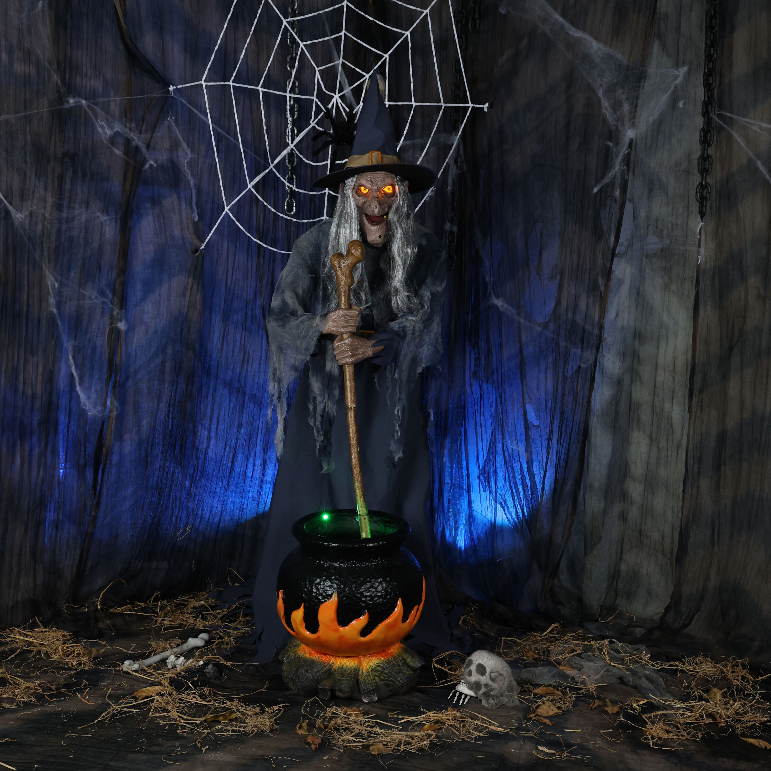 Haunted Living 6-ft Witch with Cauldron Motion Activated Lighted Animatronic in Blue | 00BS155562 | Lowe's