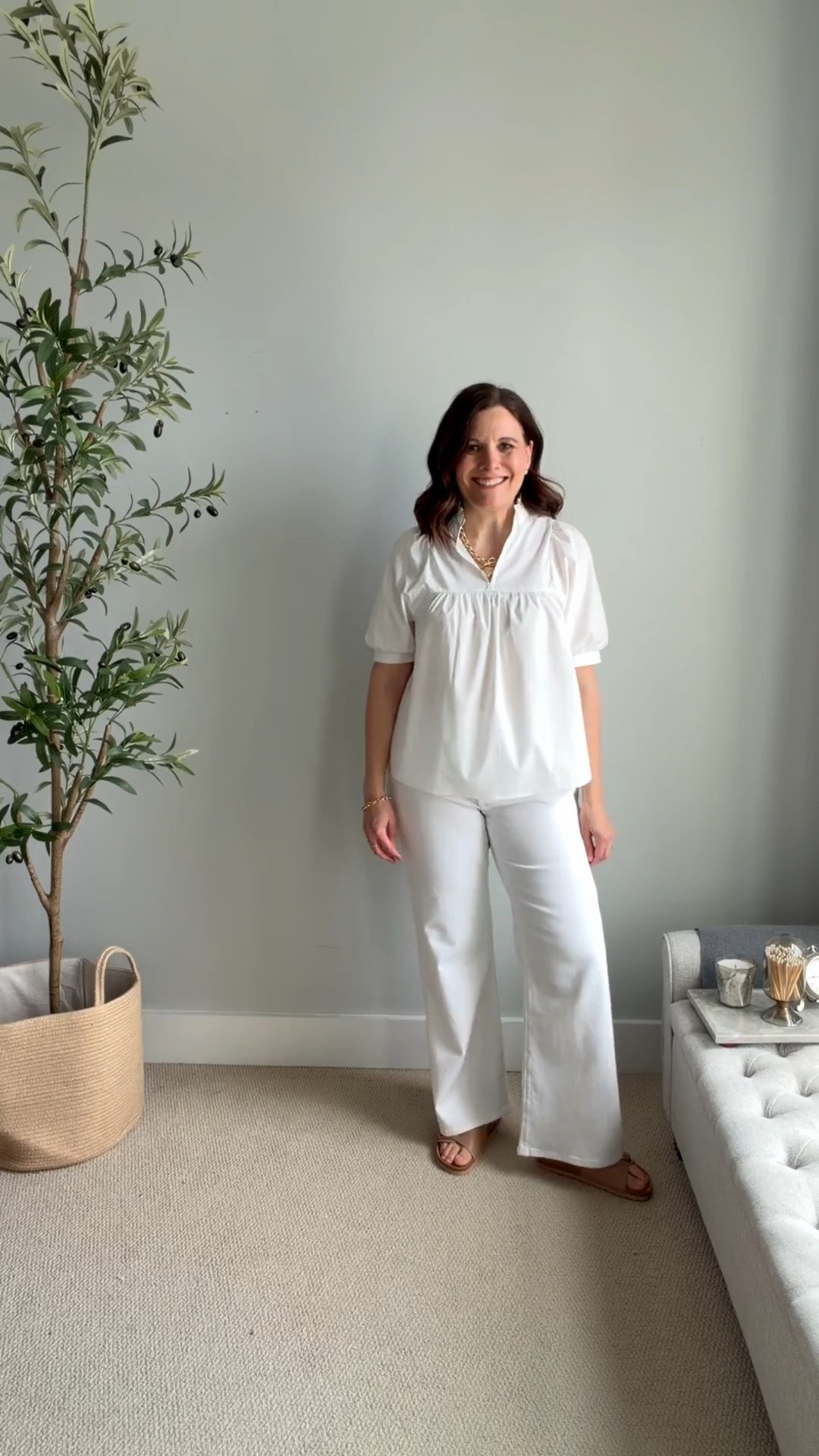 If you’re looking for a crisp white top to wear untucked, this one has a notch neck that draws the eye up to your face along with puff sleeves. It’s from Amazon and looks much more expensive than it is. It is a bit sheer. I’d wear it with a tank top. I’m in a size small. 
These white LOFT midrise wide leg jeans fit true to size. 

#LTKMidsize #LTKSaleAlert #LTKOver40