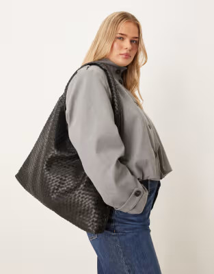 Gina Tricot large slouchy faux suede braided woven shoulder bag in black | ASOS | ASOS (Global)