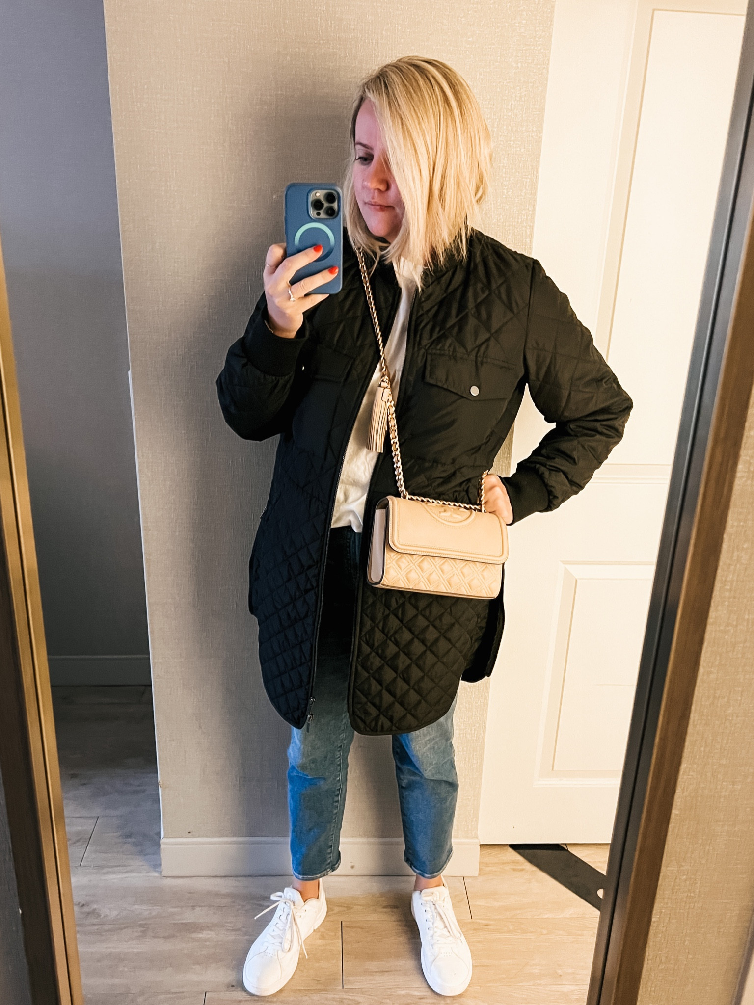 Business travel, workwear, work style, travel style, travel fashion, travel ootd, packable jacket, white sneakers, comfortable jeans, crossbody bag, Tory Burch crossbody bag

#LTKitbag #LTKstyletip #LTKtravel