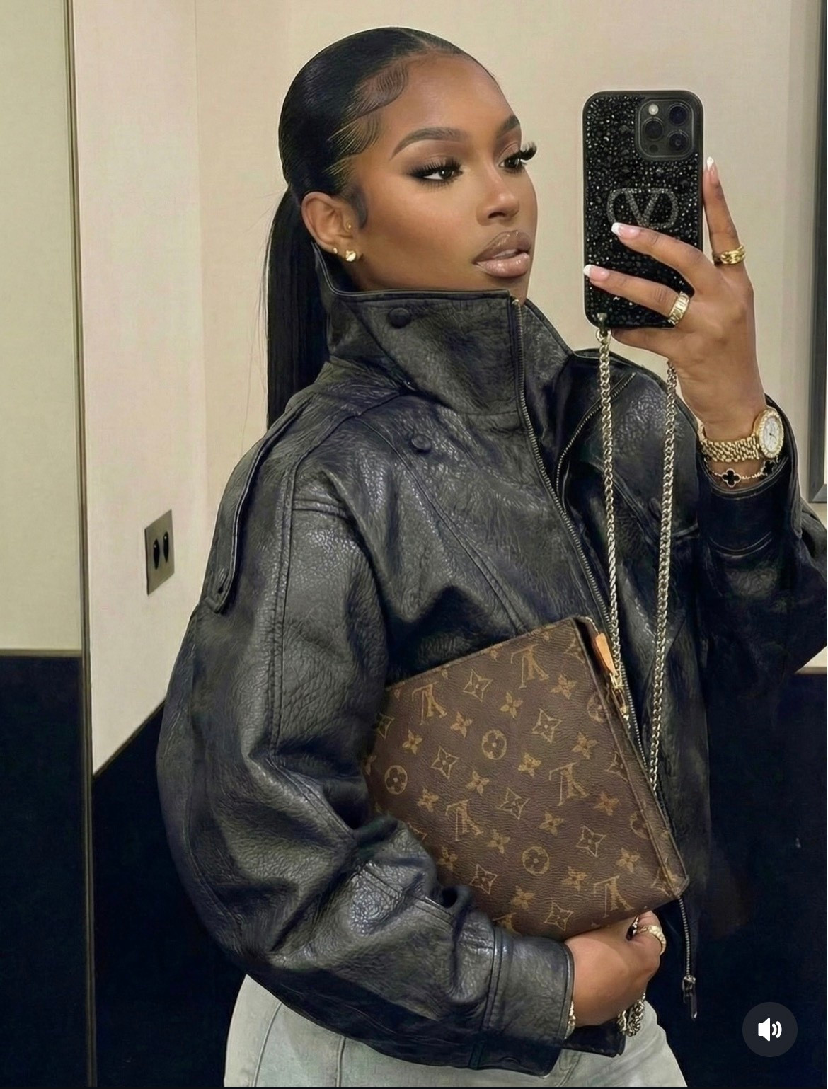 Black leather bomber jacket
Blue jeans 
Louis Vuitton toiletry bag

#LTKPetite #LTKdayinmylife #LTKmomlife