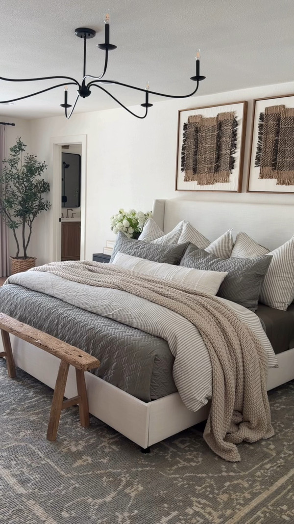 This bedroom is proof that layering simple, timeless pieces creates the coziest spaces.