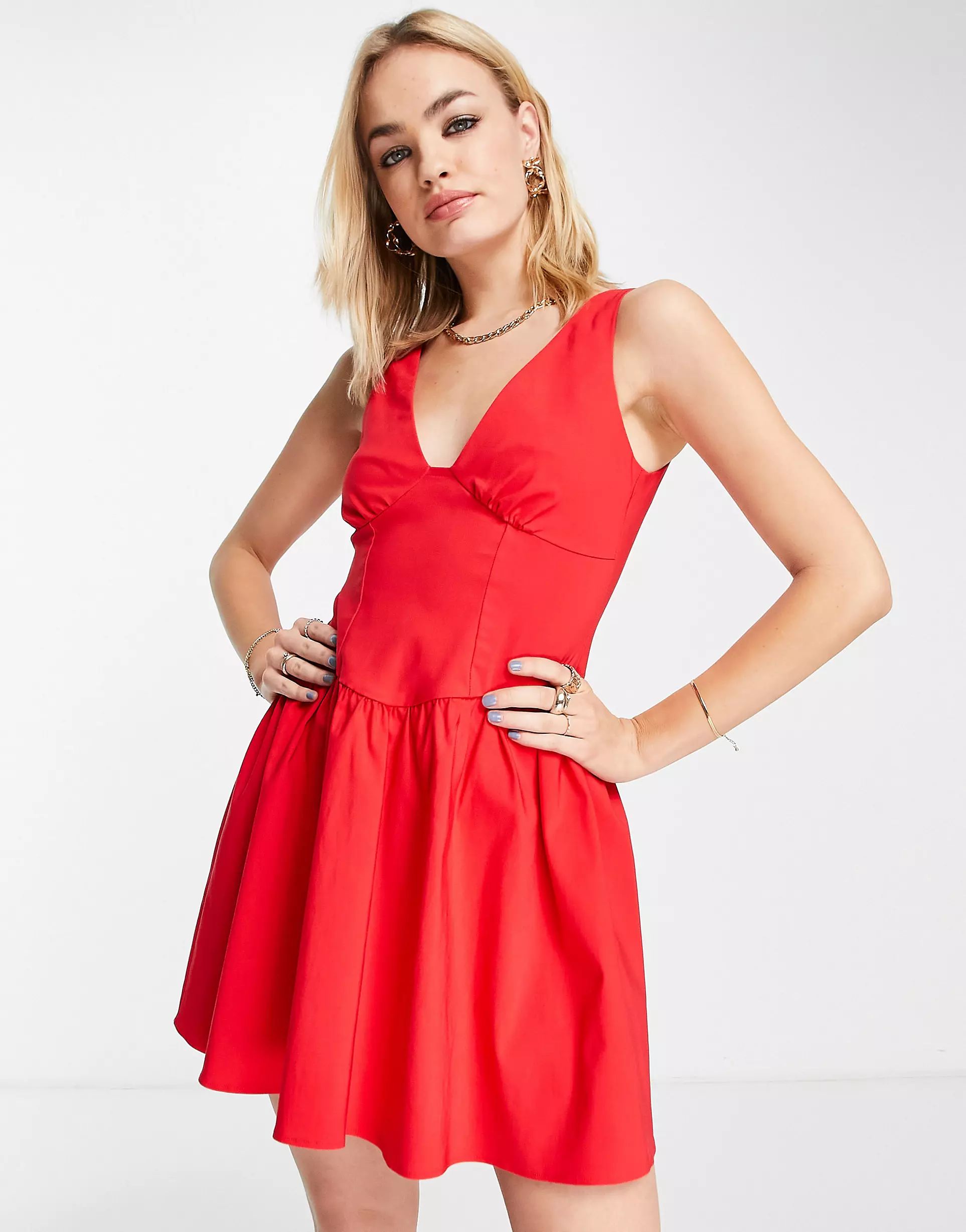 ASOS DESIGN Satin structured seamed mini dress with skater skirt in red | ASOS (Global)