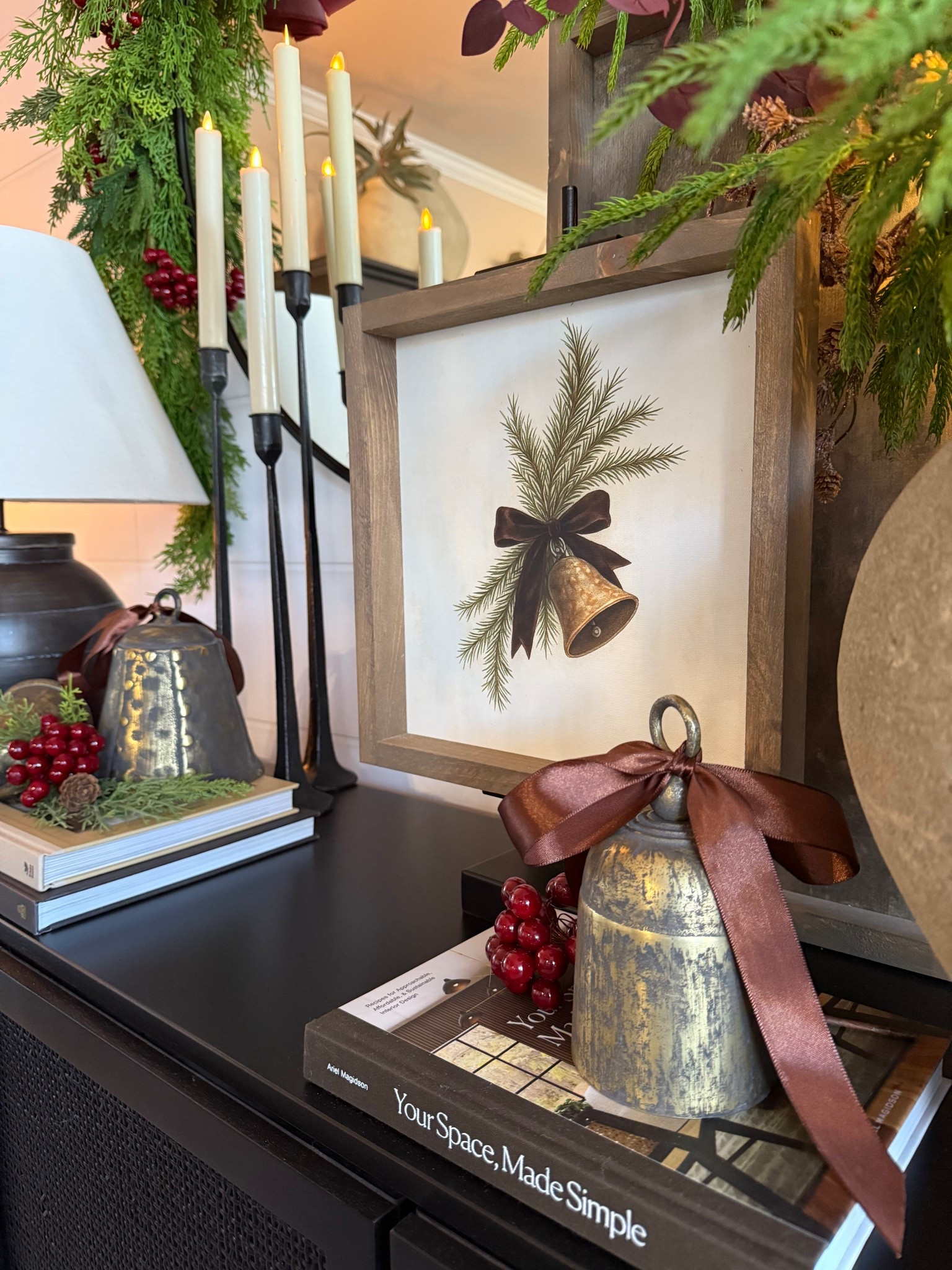 Neutral Christmas Sideboard Styling | Holiday Dining Room Decor

Follow @farmtotablecreations on Instagram for more home styling ideas.

This is my dining room sideboard dressed in warm, modern holiday layers. The 12x12 artwork in the Briarsmoke stain brings such a timeless Christmas touch — and you can use code FARMTOTABLE for 15% off. I added layered bells with satin bows, berry stems, cedar greenery, and candlelight to create that cozy, classic holiday look. Everything feels rich, warm, and beautifully neutral for the season.

#christmasdecor #diningroomdecor #holidaydecor #sideboardstyling #holidayhome #neutralchristmas #christmasinspo #homeinspo #modernorganicstyle #woodsandwhites #cozyhome

#LTKSaleAlert #LTKHome #LTKHoliday