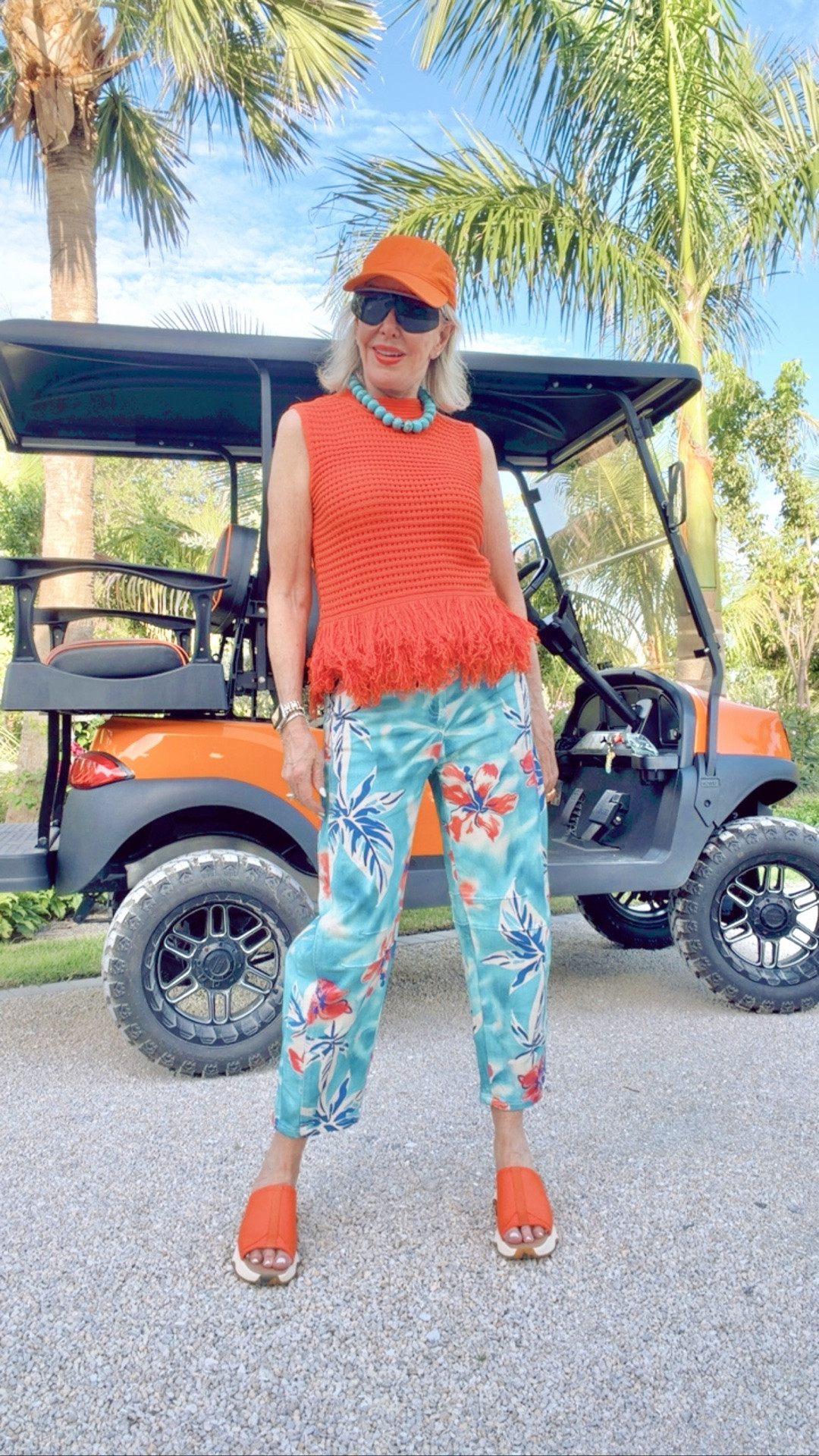 Boyfriend Baggy Barrel Jeans Floral Print Denim Ankle Pants Wide Leg Mid Rise Jeans 
Sleeveless crochet top with fringe 

Chunky turquoise necklace
Orange slides
Old Hobbie sunglasses 
Orange baseball cap

#LTKOver40 #LTKootd #LTKgrwm