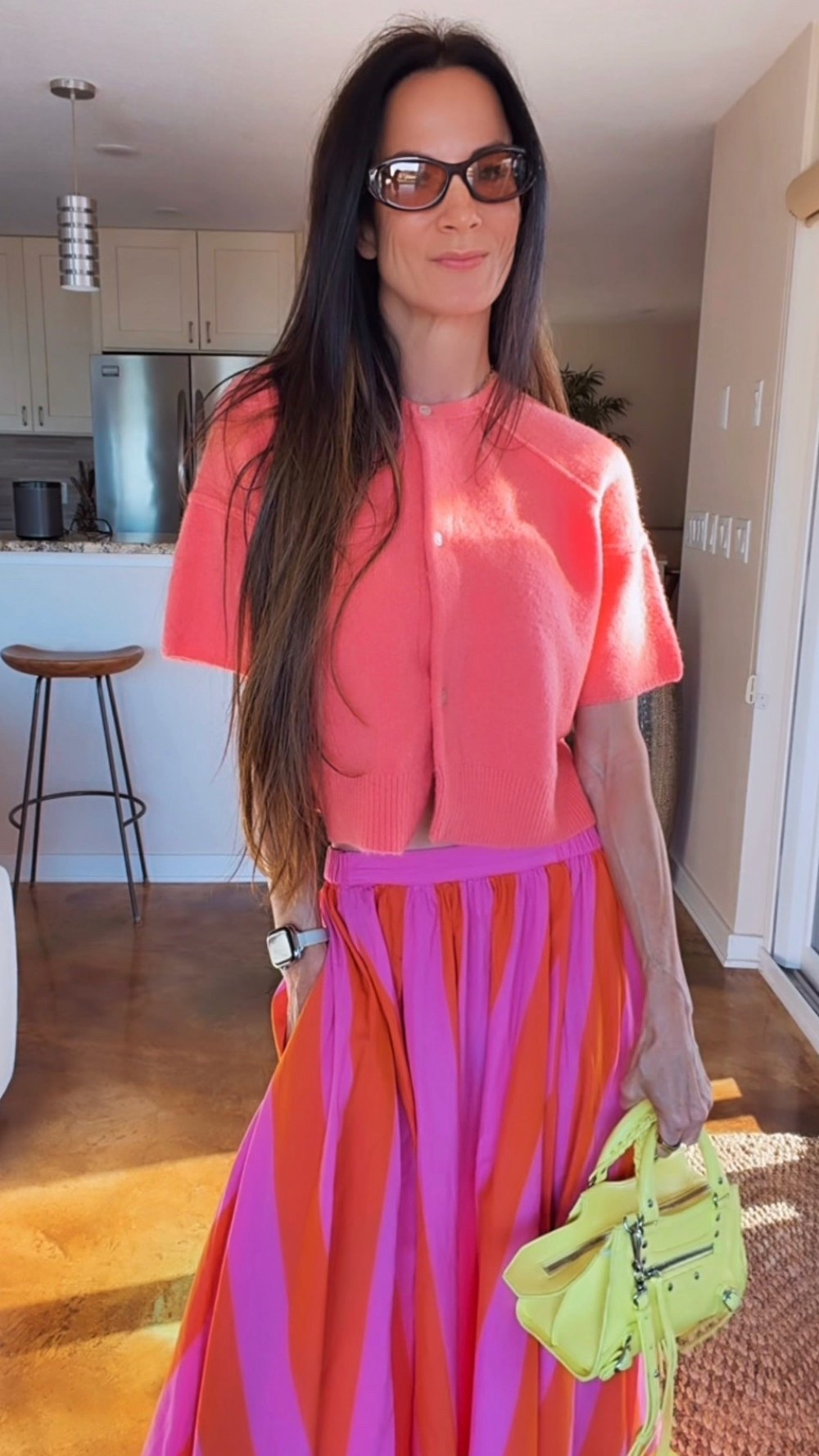 Spring just called… and she said bring the color. 💗🧡

This skirt had me at the first twirl. The movement, the color combo, the whole vibe is giving Easter brunch, beachside cocktails, or wandering through a cute little coastal town pretending we’re on vacation.

And can we talk about this sweater for a second?
Literally the softest thing on the planet. Light, cozy, and the perfect little cropped fit to balance out a fun statement skirt like this.

I finished the look with these adorable woven sandals and my favorite mini bag for a little pop of sunshine.

Effortless, colorful, and guaranteed to make you feel like spring has officially arrived.

#LTKdayinmylife #LTKgrwm #LTKSpringSale