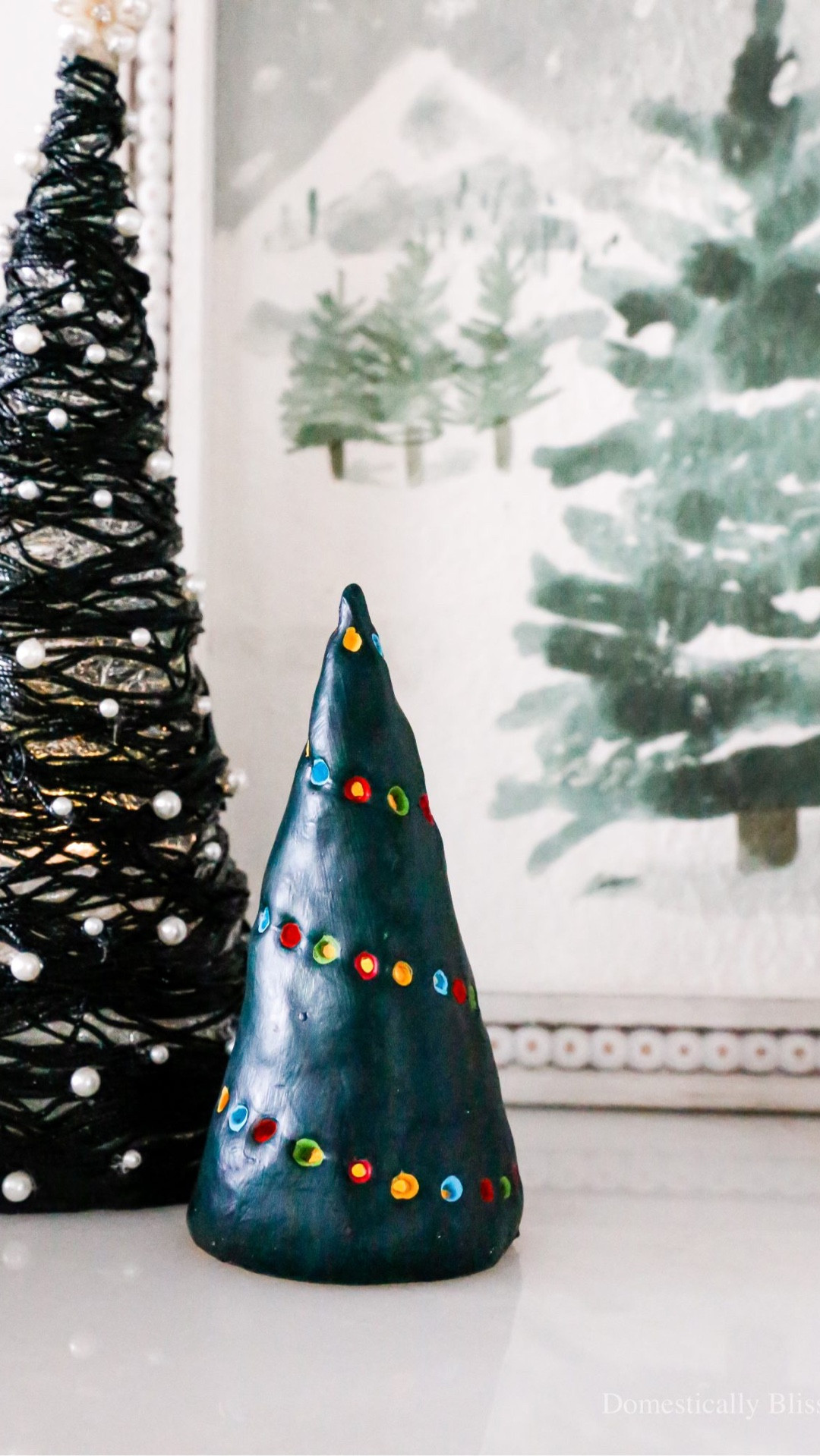 This DIY Clay Christmas Tree Candle Holder hides a flameless candle that shines through colorful Christmas lights.

See details:
https://domesticallyblissful.com/diy-clay-christmas-tree-candle-holder/

🔗 Join our newsletter: https://domesticallyblissful.com/newsletter/ 

#LTKHome #LTKSeasonal #LTKHoliday