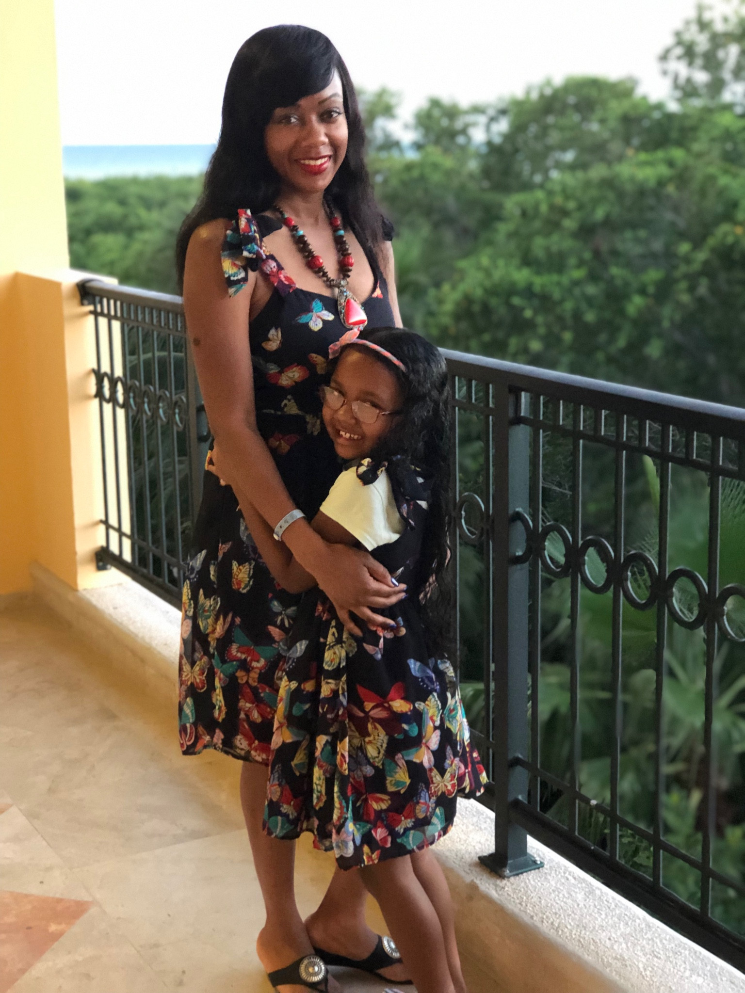 Mommy and me matching butterfly style dresses while on vacation in Cancun, Mexico. 

#LTKfamily #LTKFind #LTKtravel