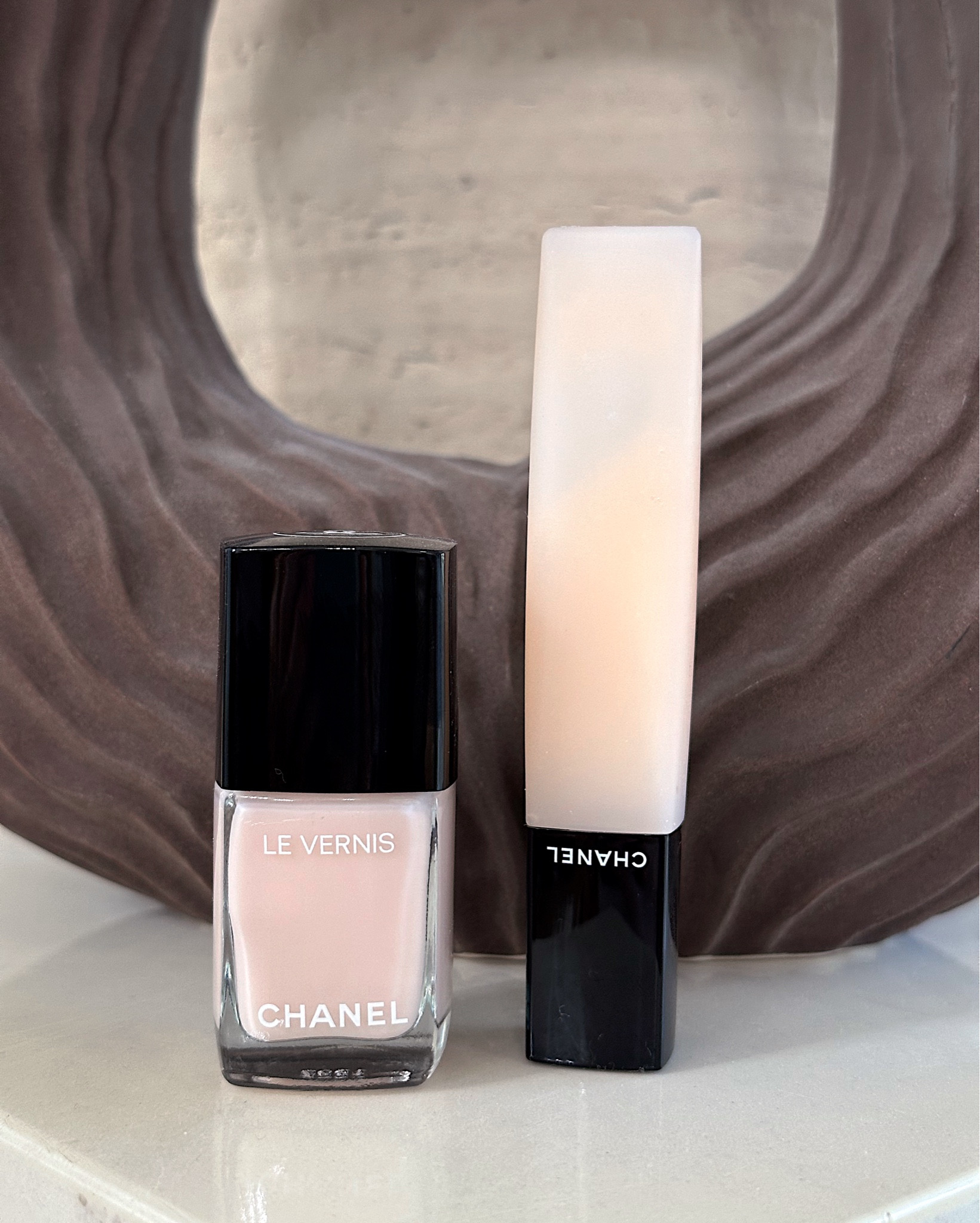 My go-to summer nails via Chanel beauty at Nordstrom. This ballerina pink from Chanel looks amazing with a natural summer tan. Keep cuticles looking fresh with this Chanel cuticle oil (which smells amazing, btw!) I apply this oil ever evening before bedtime to help with soft hydrated nails. 



#LTKBeauty #LTKFindsUnder100 #LTKSeasonal